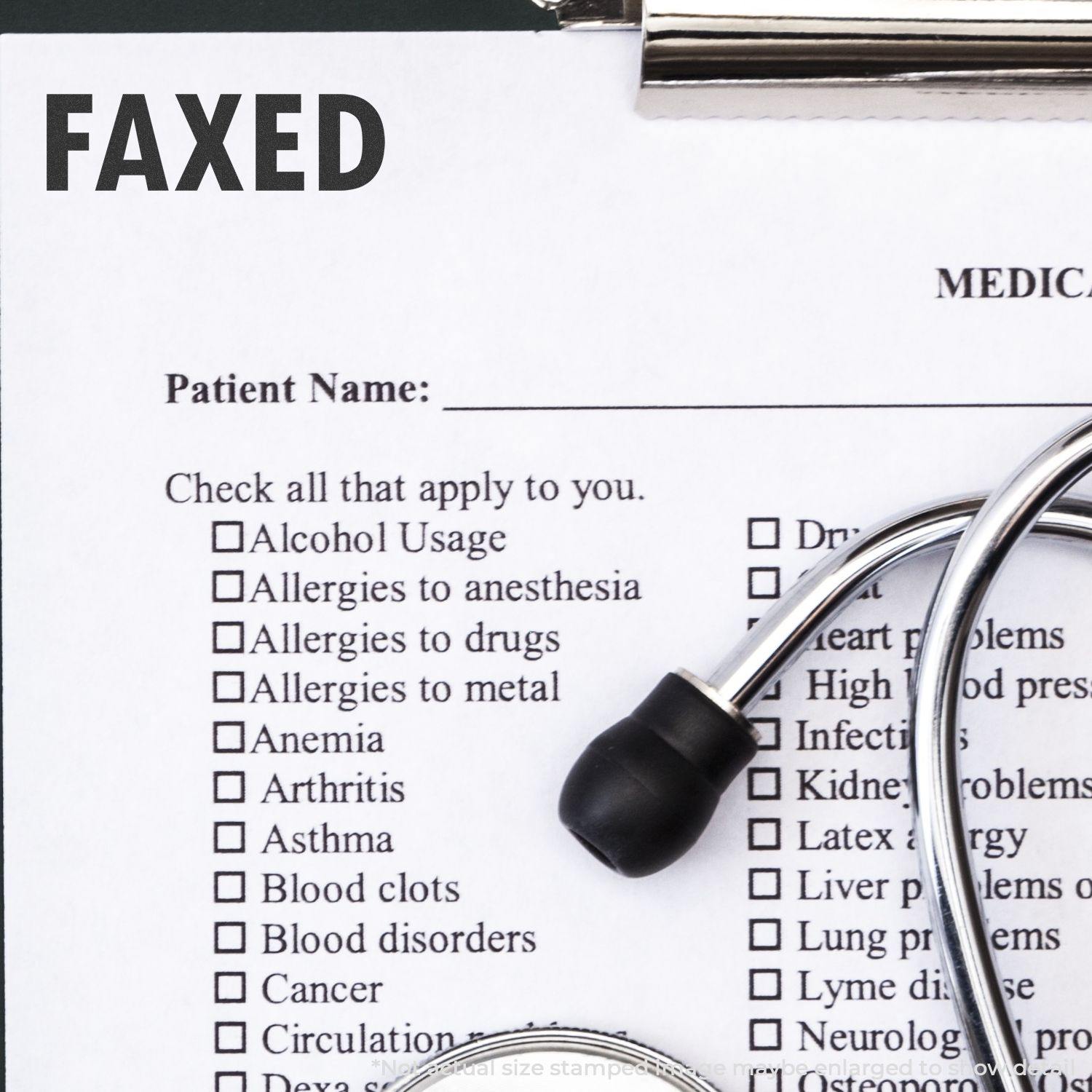 A medical form stamped with FAXED using the Large Faxed Rubber Stamp, with a stethoscope placed on top of the form.