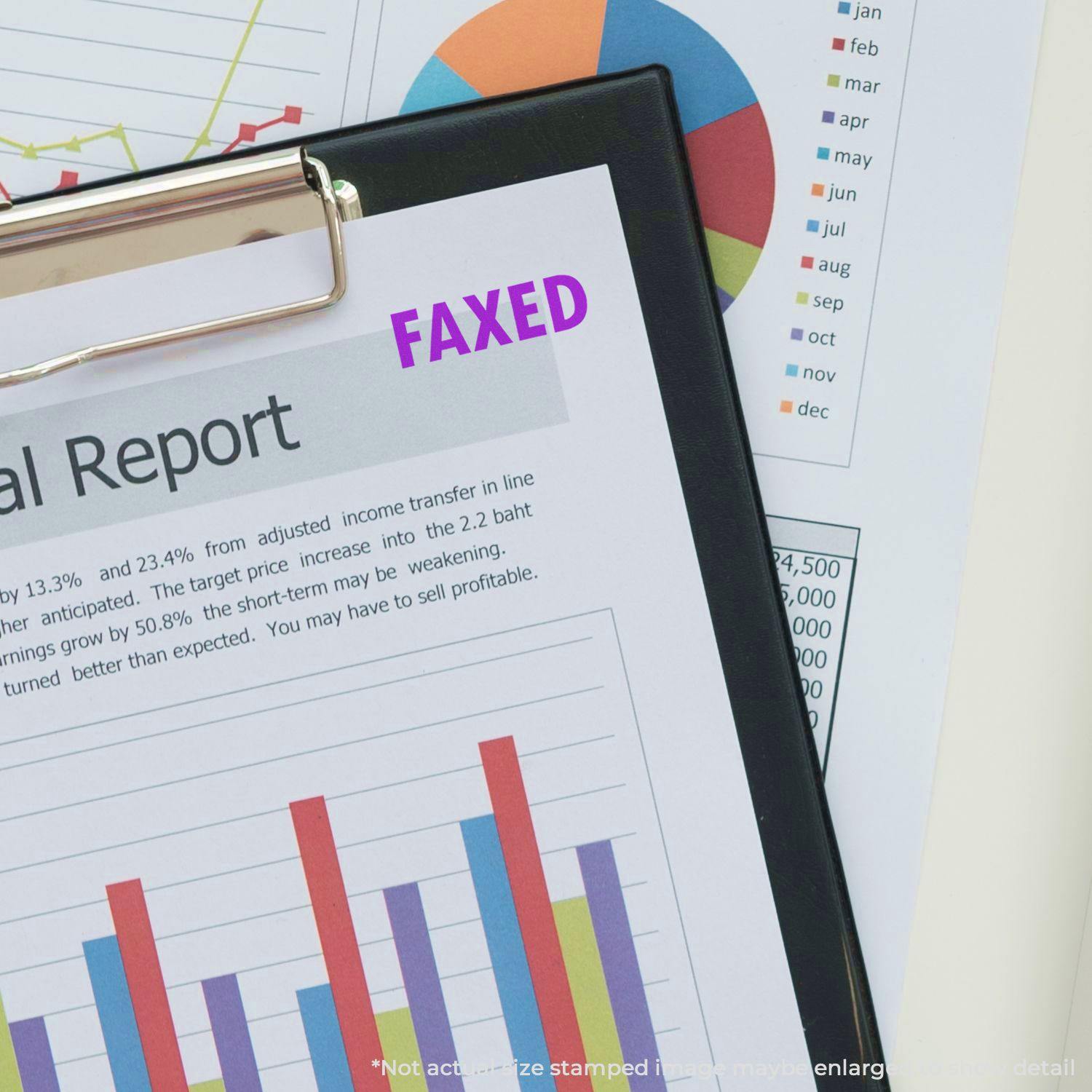 A clipboard with a financial report stamped FAXED using a Self Inking Faxed Stamp, surrounded by charts and graphs.