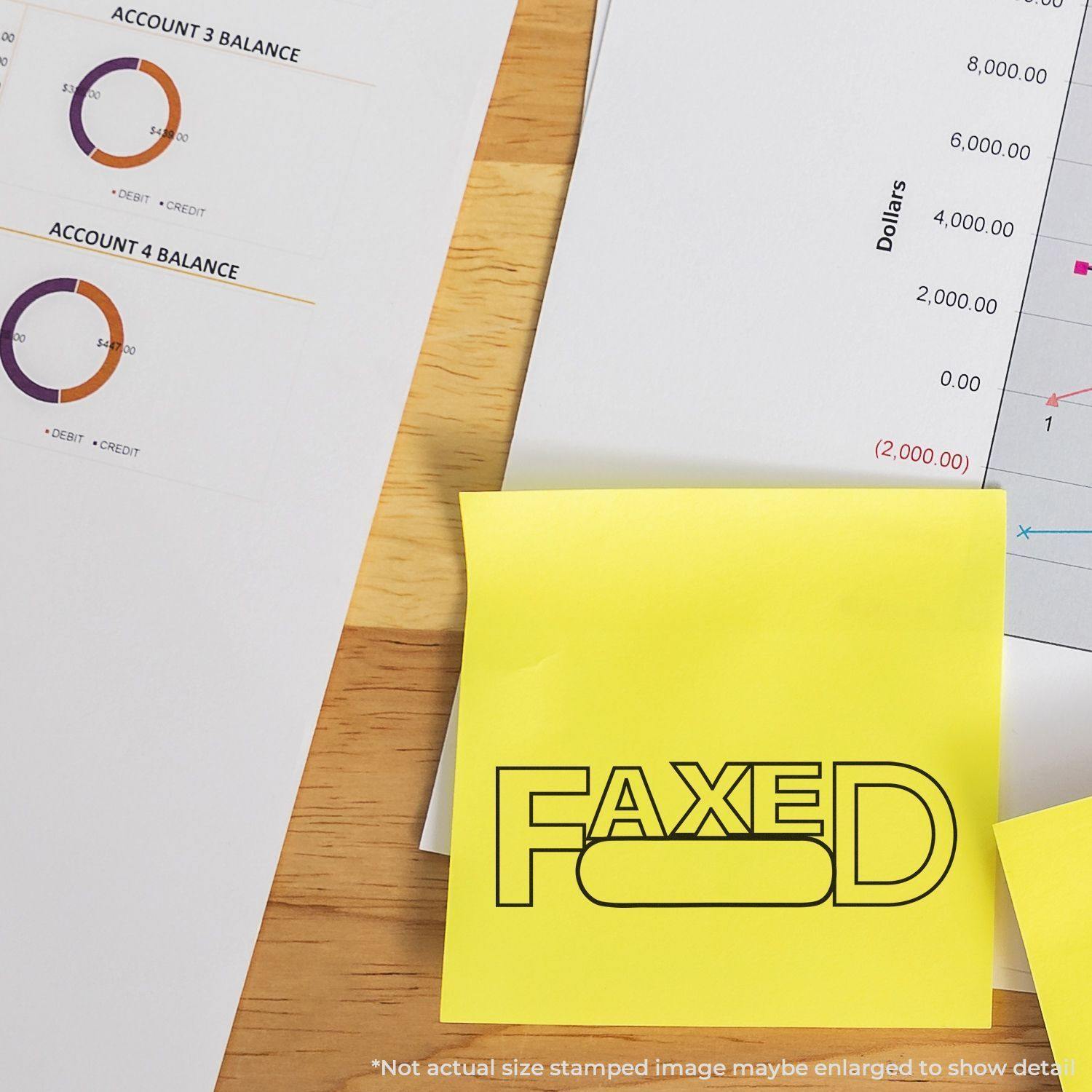 Large Self Inking Faxed with Round Date Box Stamp used on a yellow sticky note, placed on financial documents with charts and graphs.