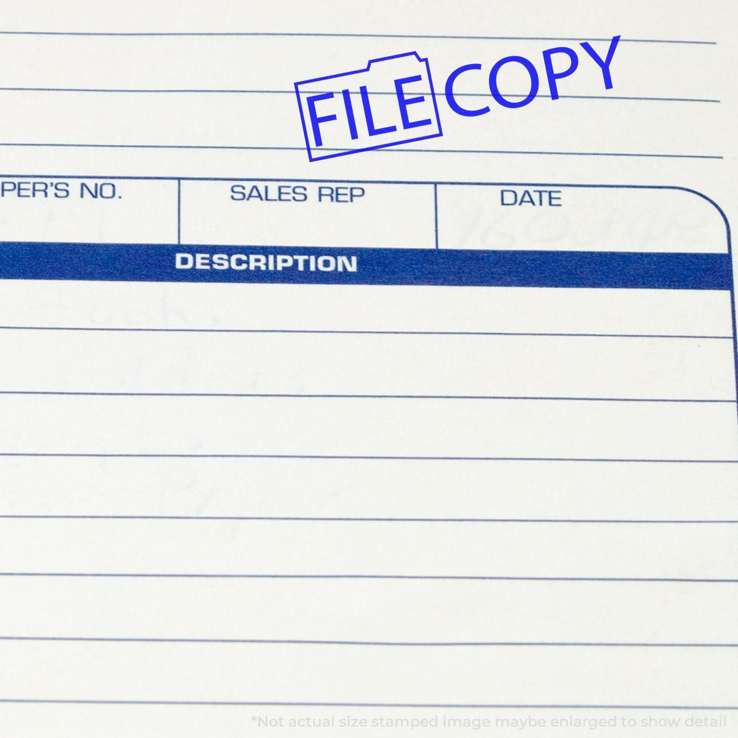 File Copy with Folder Rubber Stamp used on a document, showing the stamped text 'FILE COPY' in blue ink on a form.