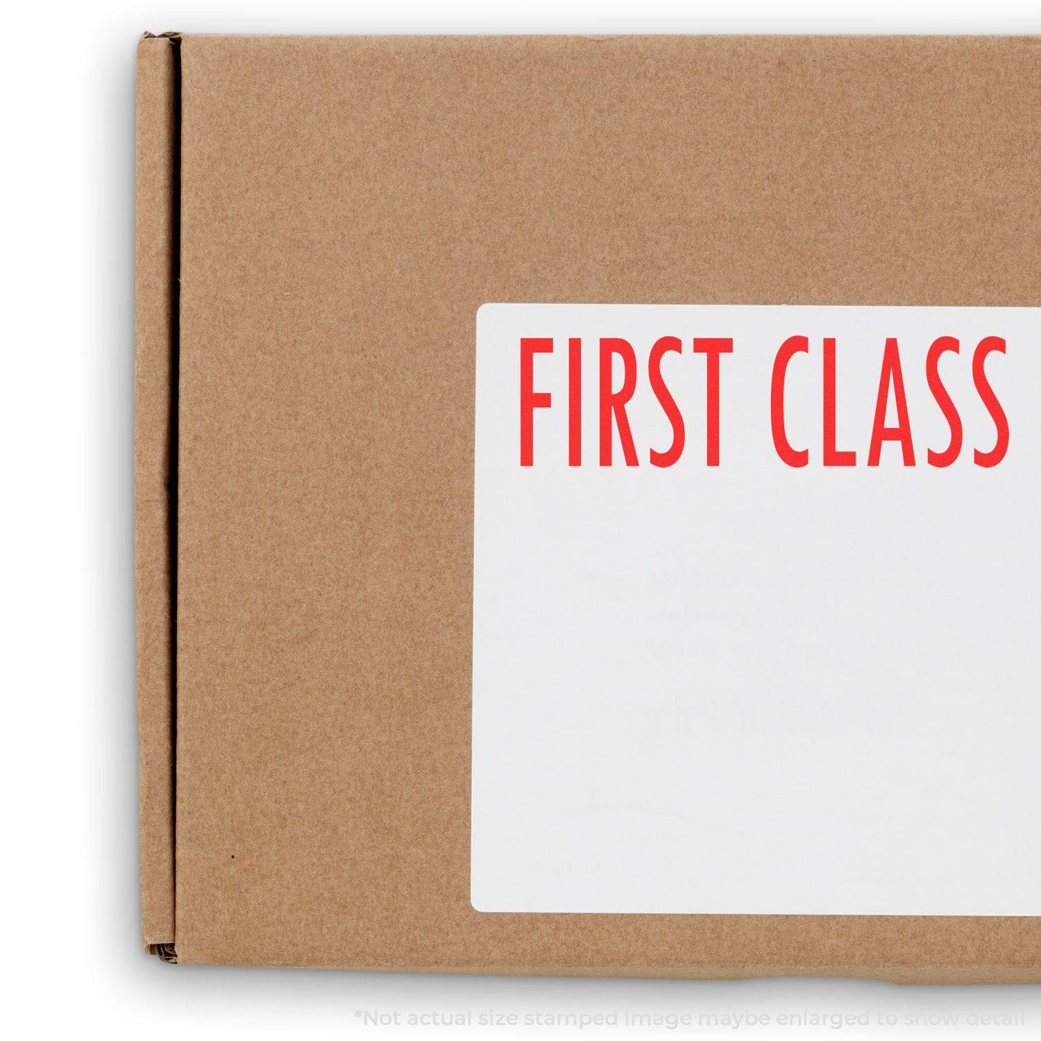 A cardboard box stamped with FIRST CLASS in red ink using the First Class Mailing Rubber Stamp.