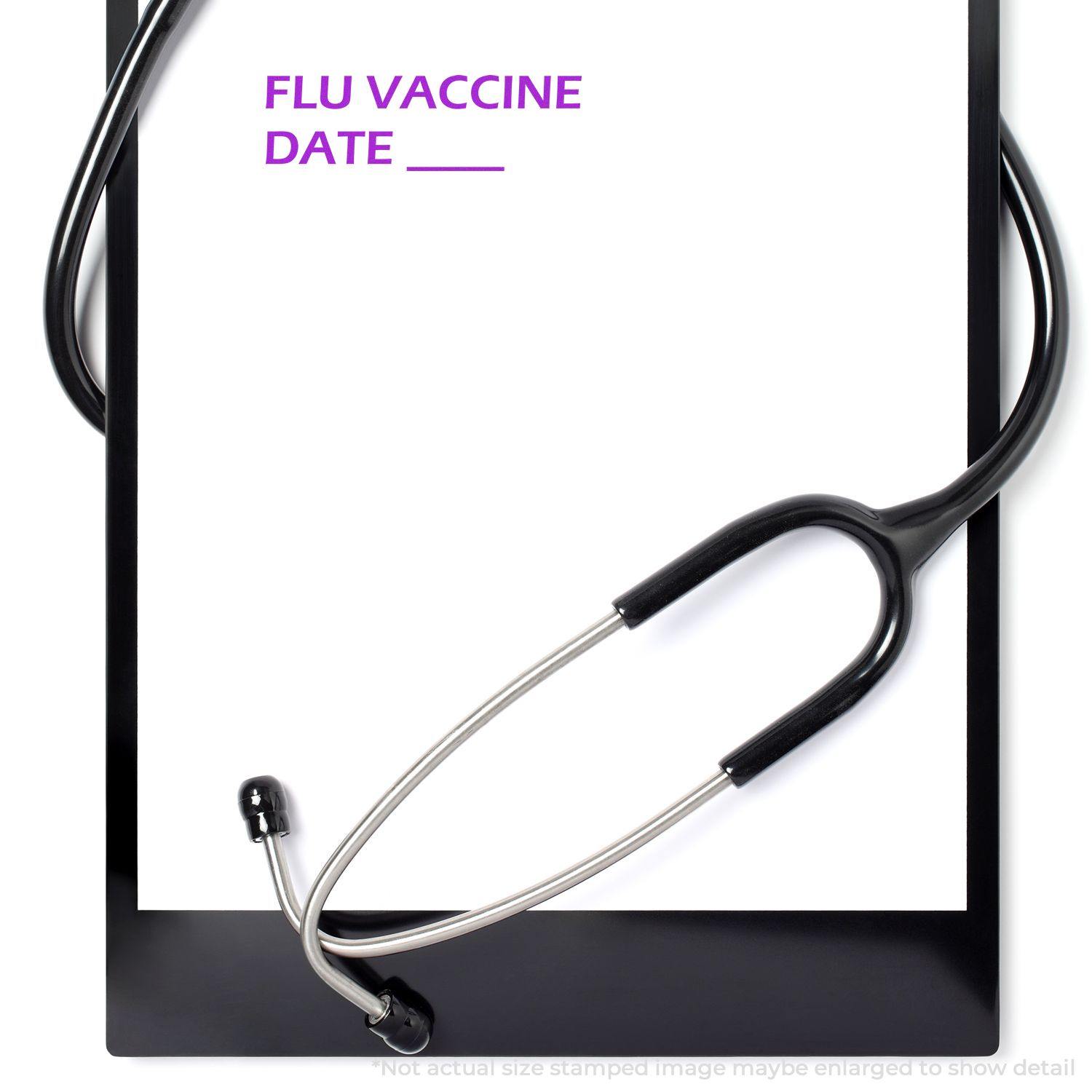 Flu Vaccine Date Rubber Stamp on a clipboard with a stethoscope, ready to mark the date of flu vaccination.