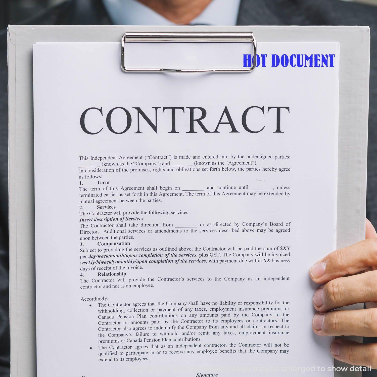 A person holding a clipboard with a contract and a blue Hot Document rubber stamp mark at the top.