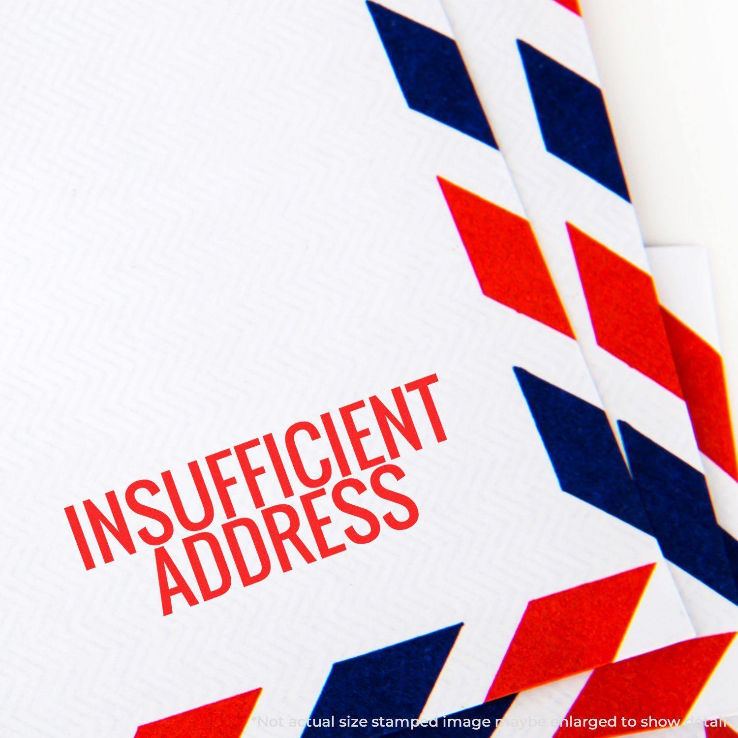 Envelope stamped with Insufficient Address using the Large Insufficient Address Rubber Stamp, featuring red and blue diagonal patterns.