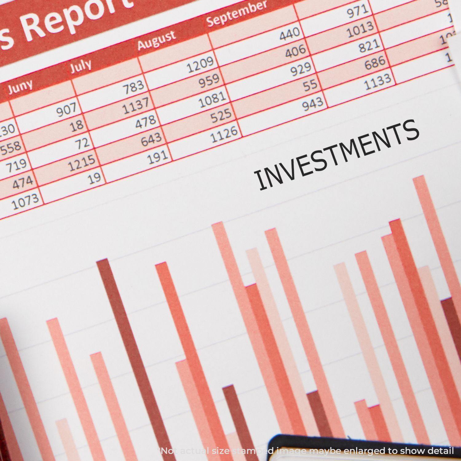 Large Pre-Inked Investments Stamp marking 'INVESTMENTS' on a financial report with charts and data in the background.