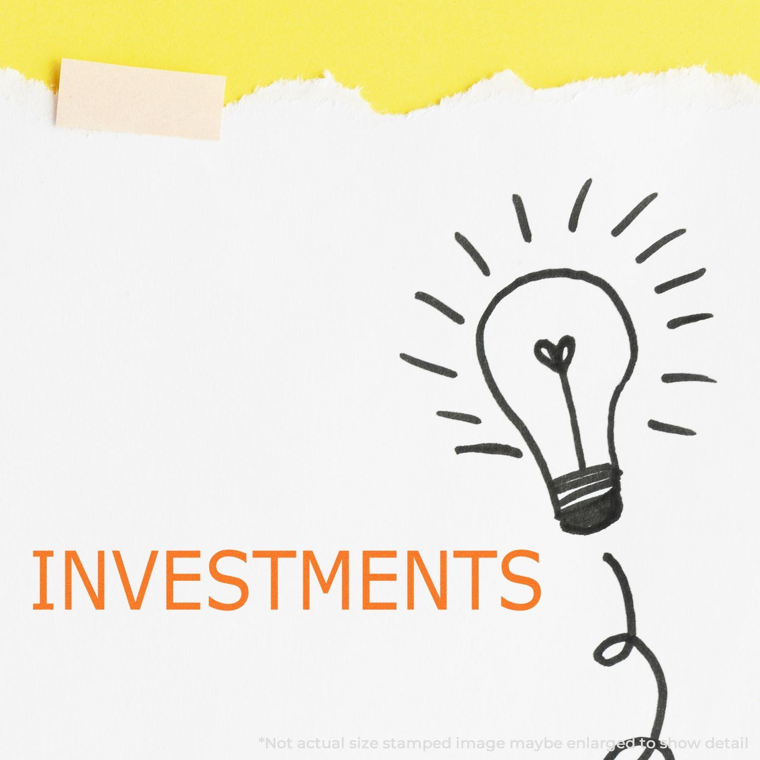 Slim Pre-Inked Investments Stamp used on white paper with a lightbulb drawing and the word INVESTMENTS in orange text.