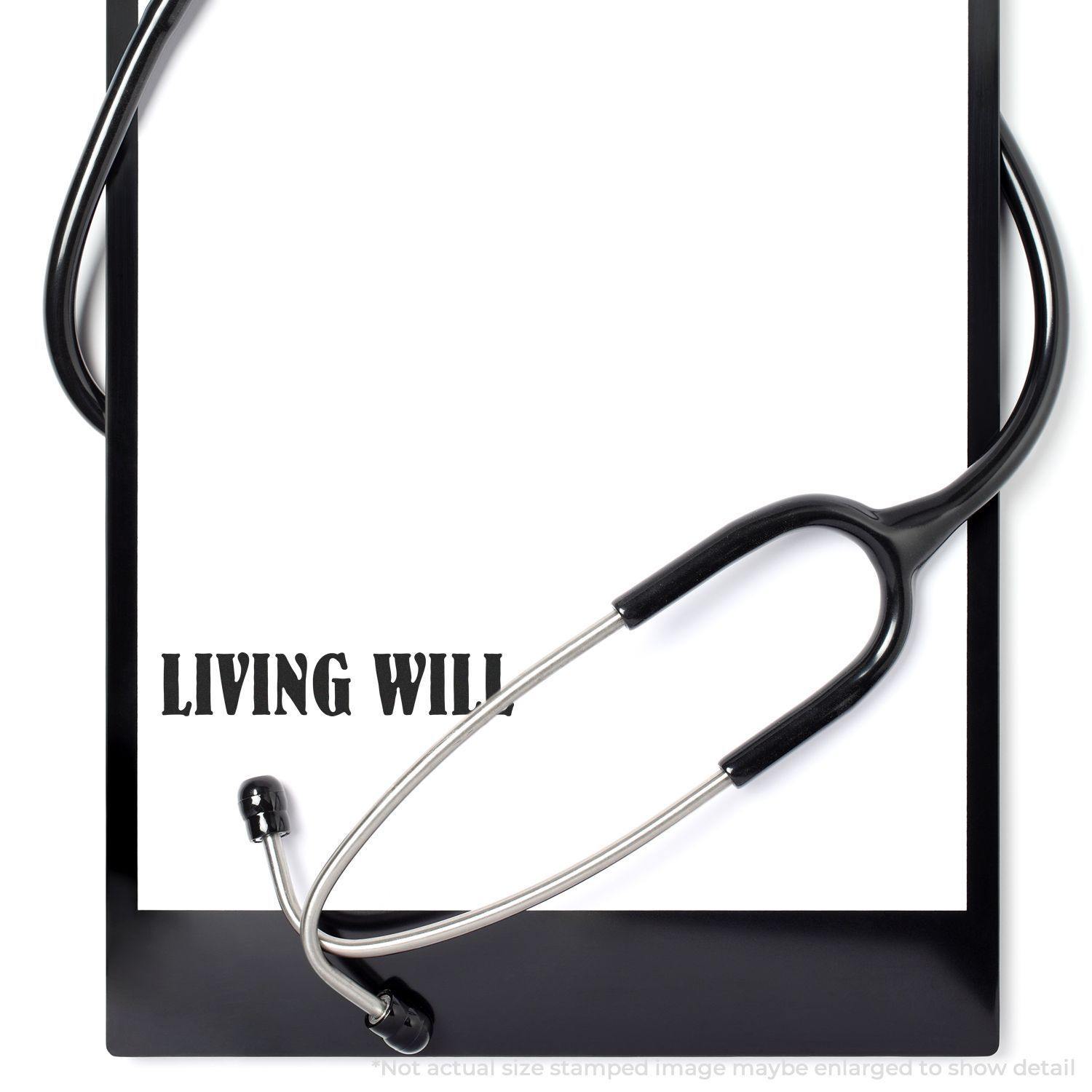 A Large Pre-Inked Living Will Stamp imprint on a white paper with a stethoscope placed on top, indicating medical context.