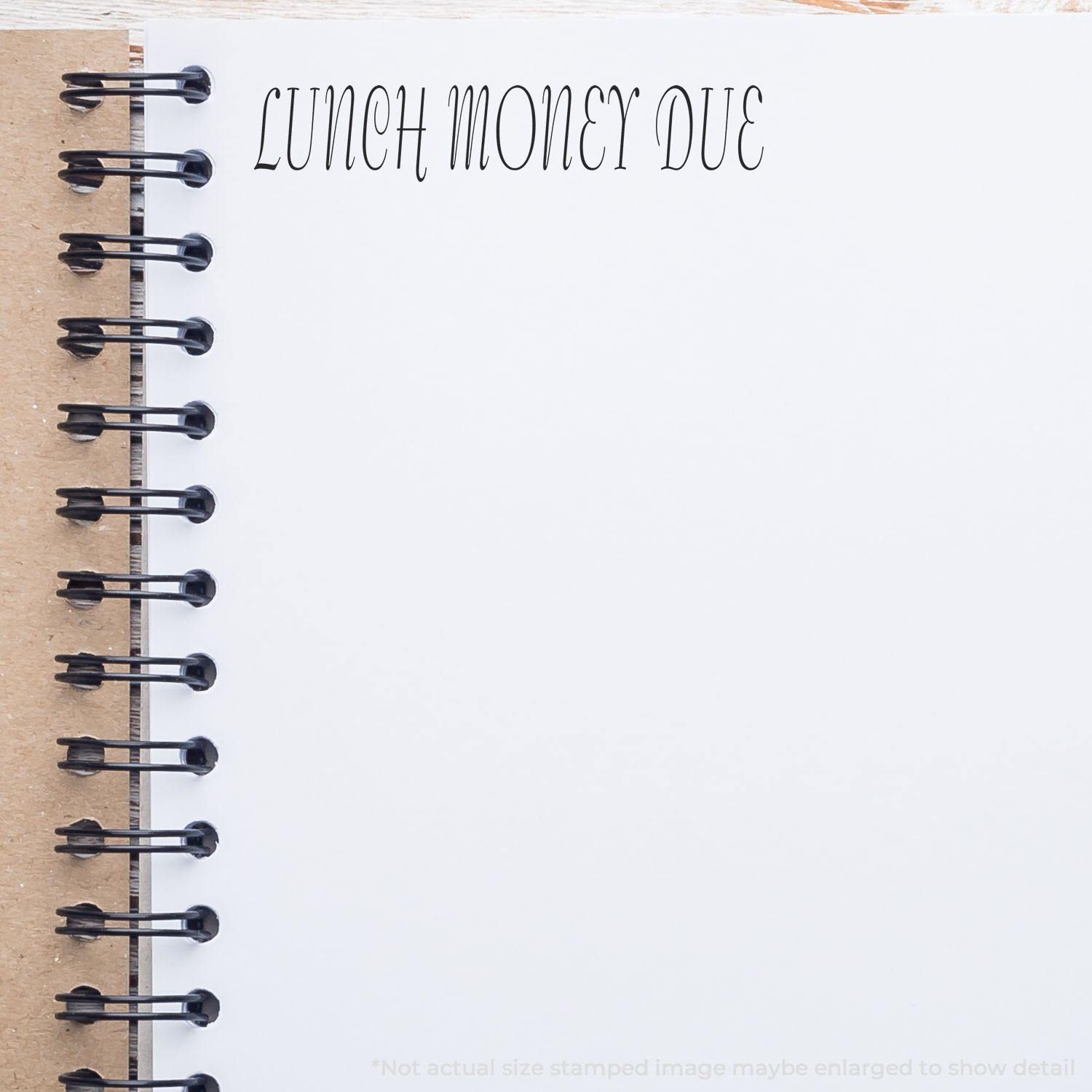 Notebook page stamped with 'LUNCH MONEY DUE' using the Large Self Inking Lunch Money Due Stamp, showing clear and bold text.