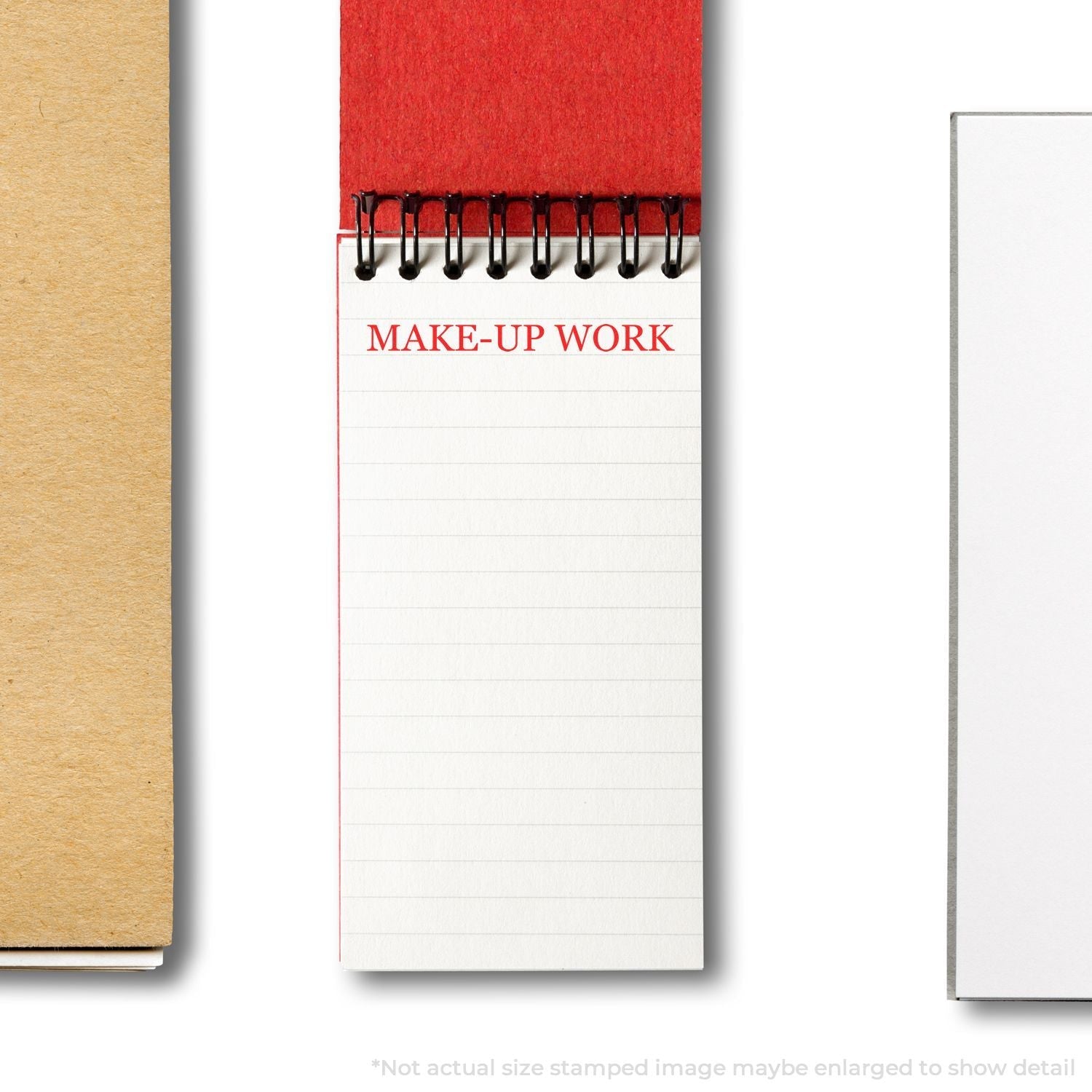 A notepad stamped with MAKE-UP WORK using the Self Inking Make Up Work Stamp, placed on a white surface with a red cover.