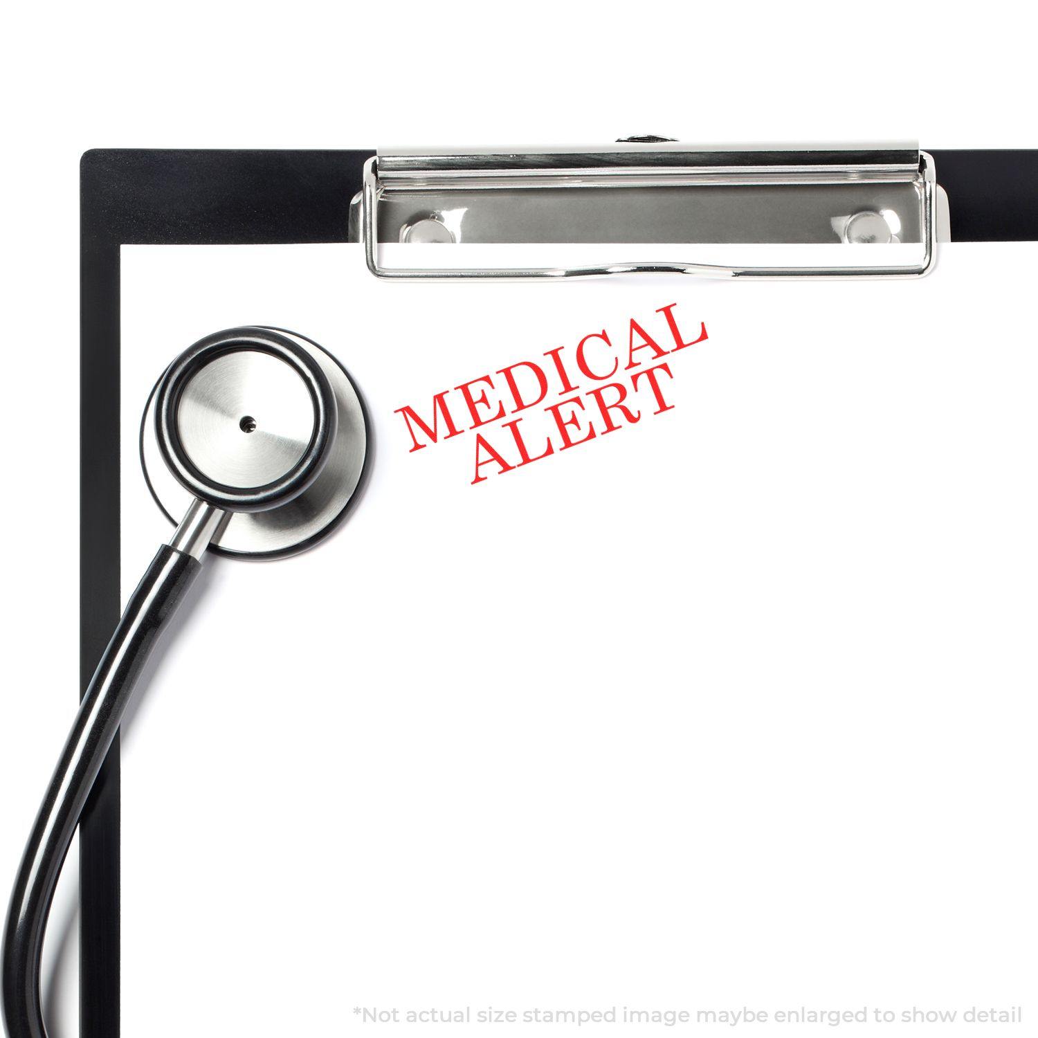 Large Medical Alert Rubber Stamp in red ink on a white clipboard with a stethoscope.