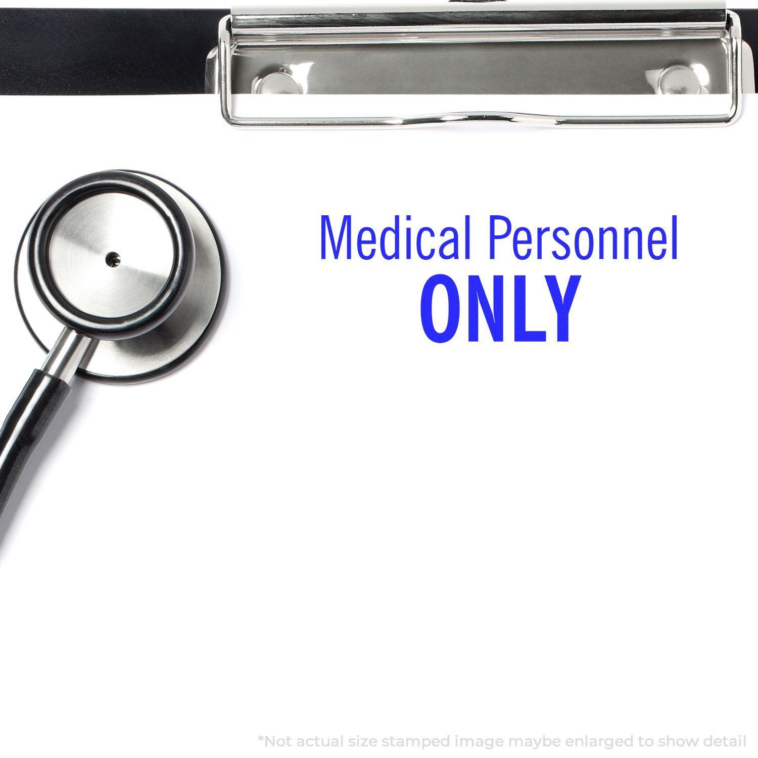 Large Medical Personnel Only Rubber Stamp in use on a clipboard with a stethoscope nearby.