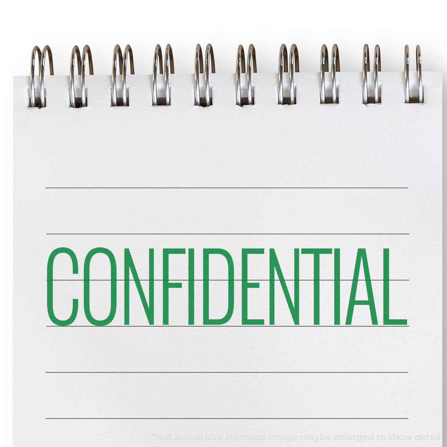 Large Narrow Font Confidential Rubber Stamp In Use Photo