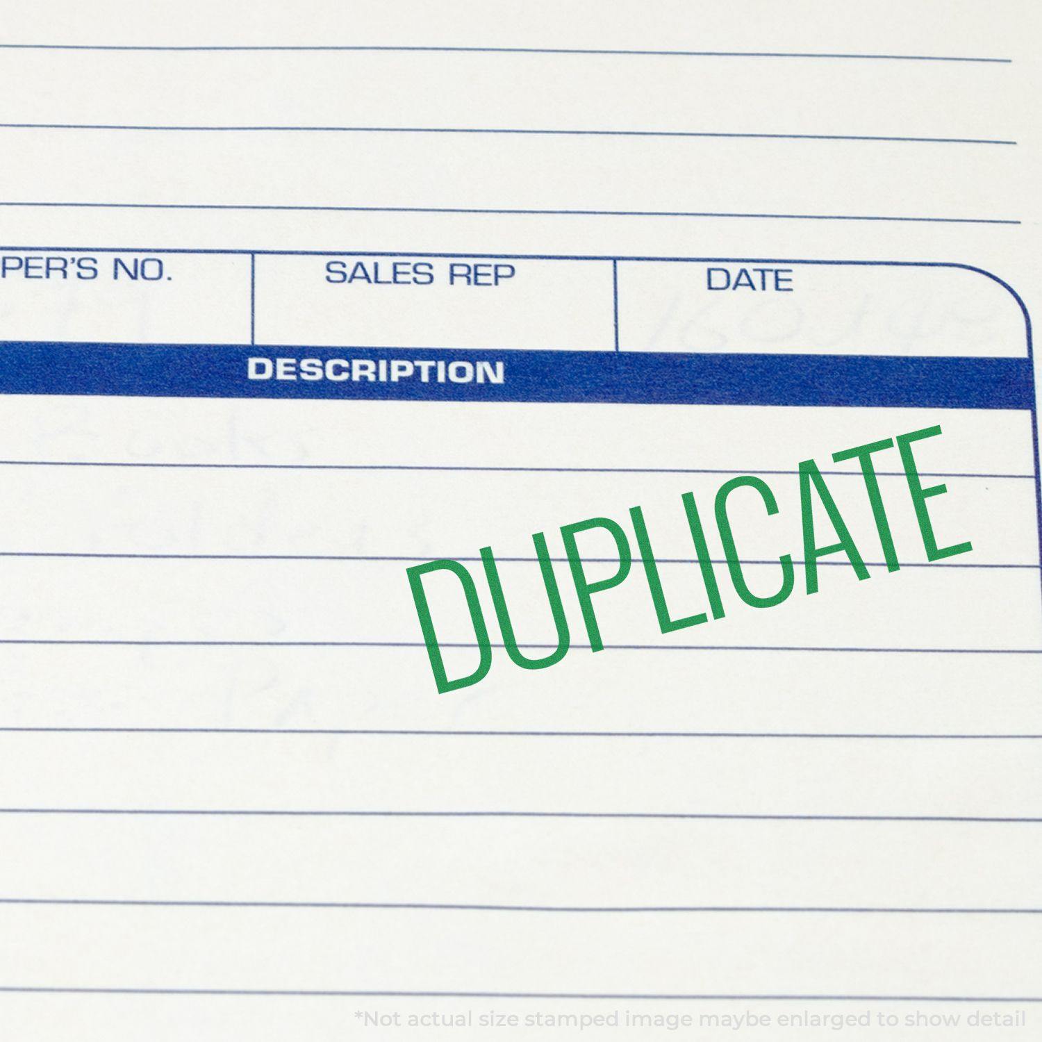 Large Narrow Font Duplicate Rubber Stamp marking 'DUPLICATE' in green ink on a lined form with sections for sales rep, date, and description.