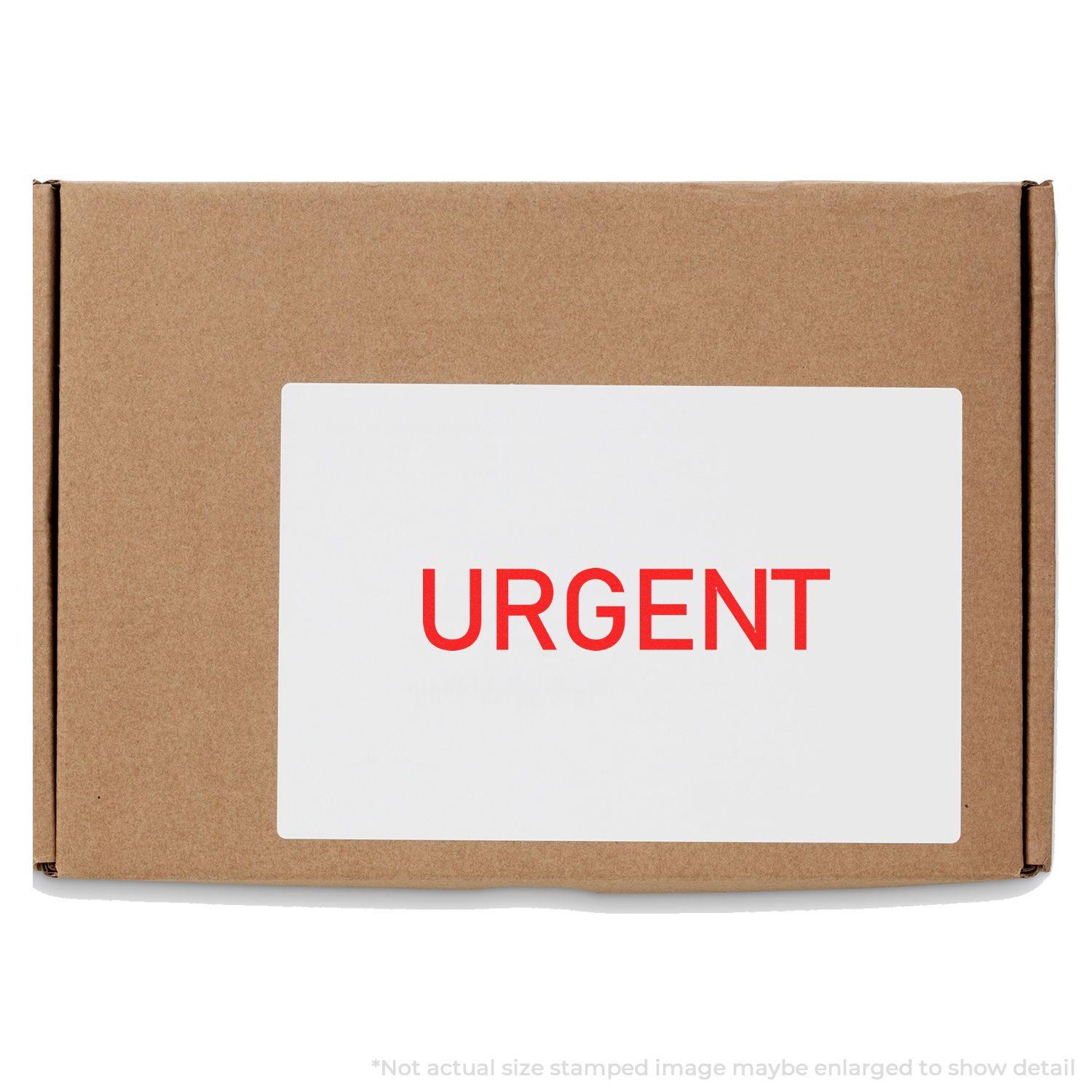 Cardboard box stamped with URGENT in red using the Large Narrow Font Urgent Rubber Stamp.