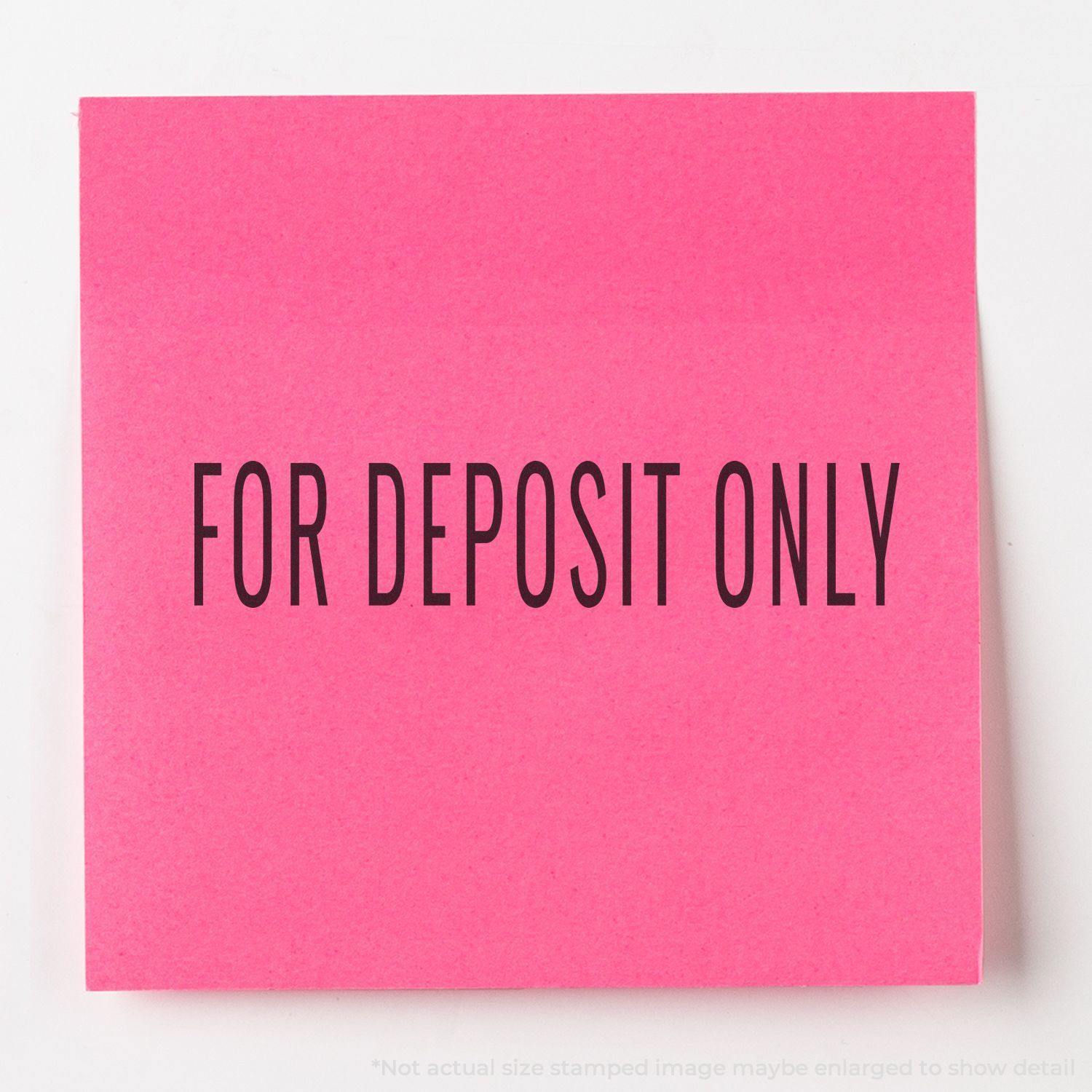 Large Pre-Inked Narrow For Deposit Only Stamp on a pink paper, displaying the text FOR DEPOSIT ONLY in bold black letters.