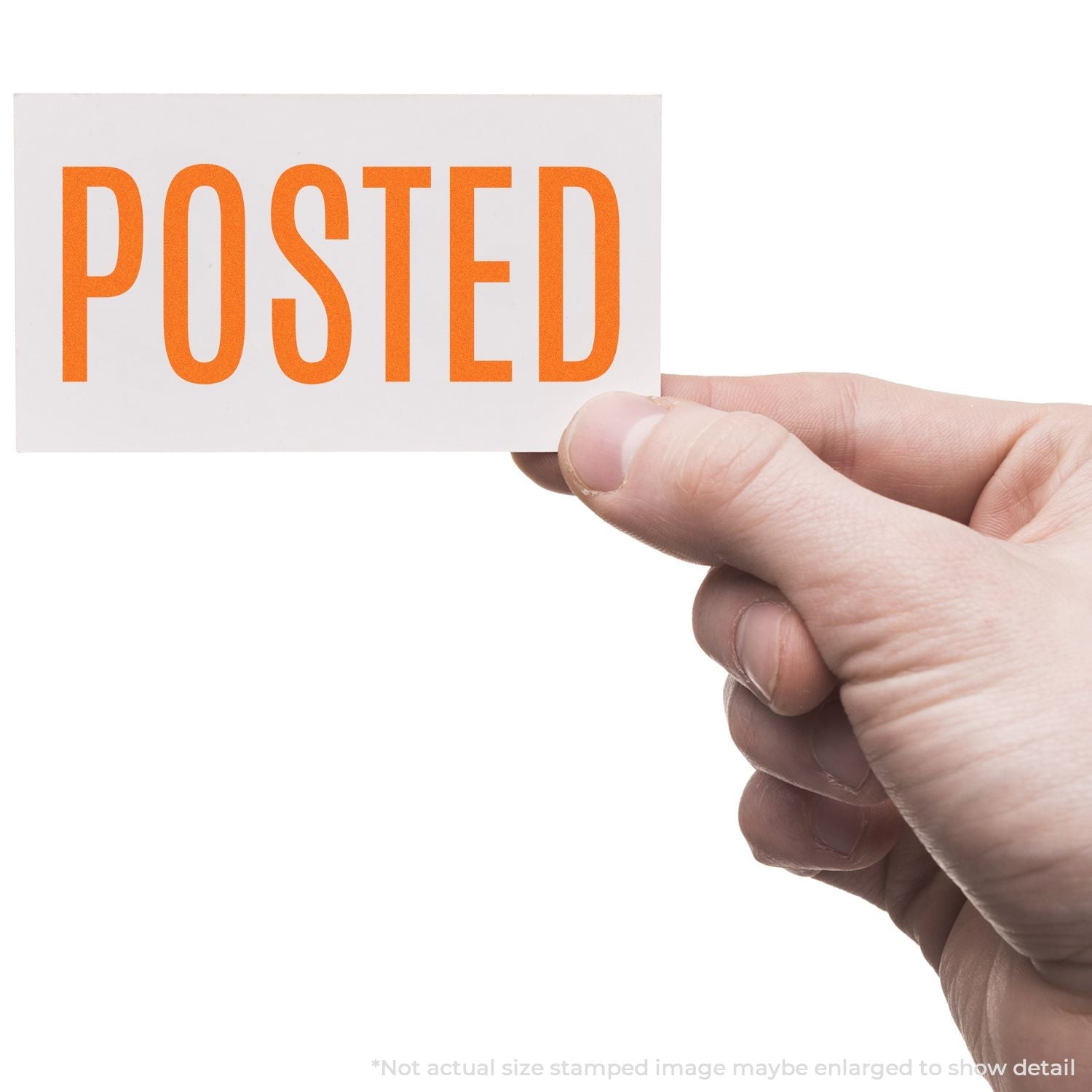 A hand holding a white card stamped with POSTED in orange using the Self Inking Narrow Posted Stamp.