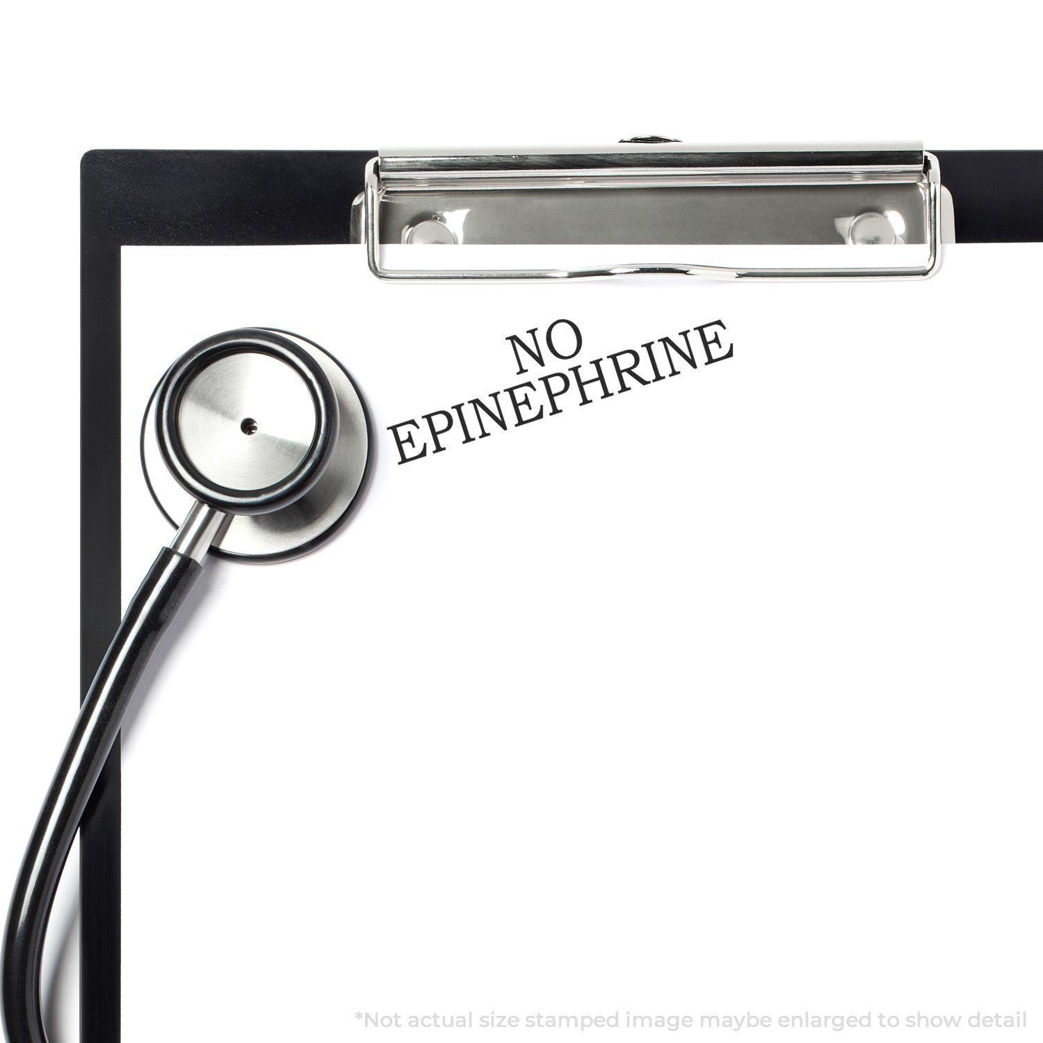 Clipboard with stethoscope and NO EPINEPHRINE stamped using the Large Pre-Inked No Epinephrine Stamp.