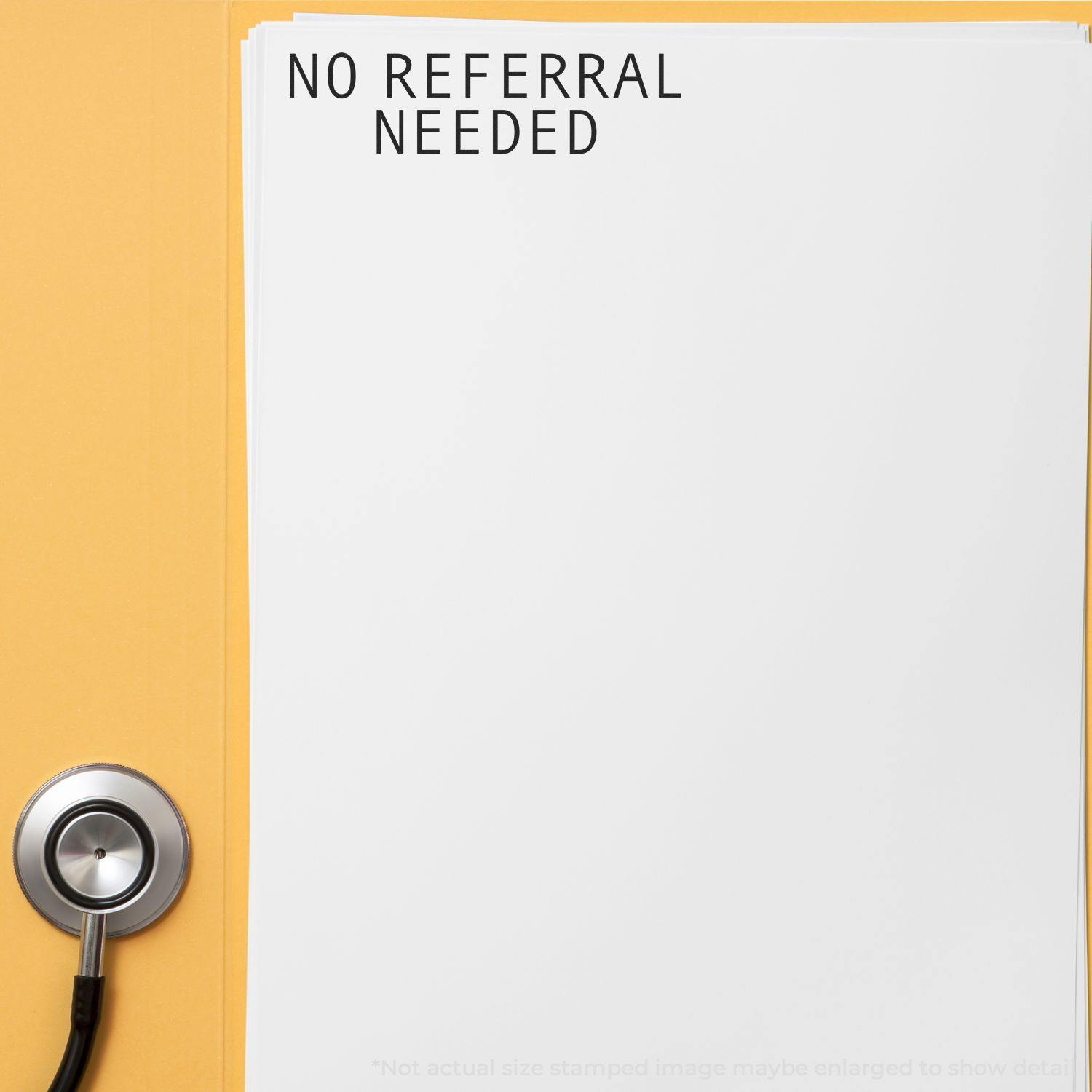 Large Pre-Inked No Referral Needed Stamp used on a white sheet of paper, with a stethoscope placed beside it on a yellow background.