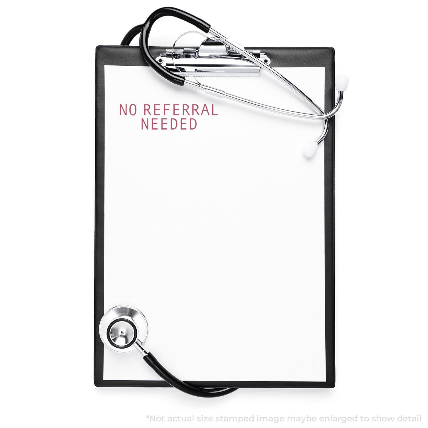 Slim Pre-Inked No Referral Needed Stamp on a clipboard with a stethoscope, indicating no referral is required for medical services.