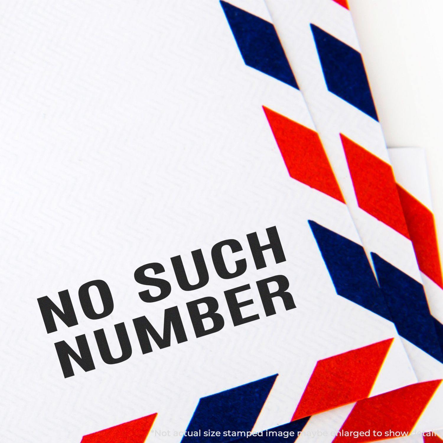 Large No Such Number Rubber Stamp used on an envelope with red and blue chevron border design.