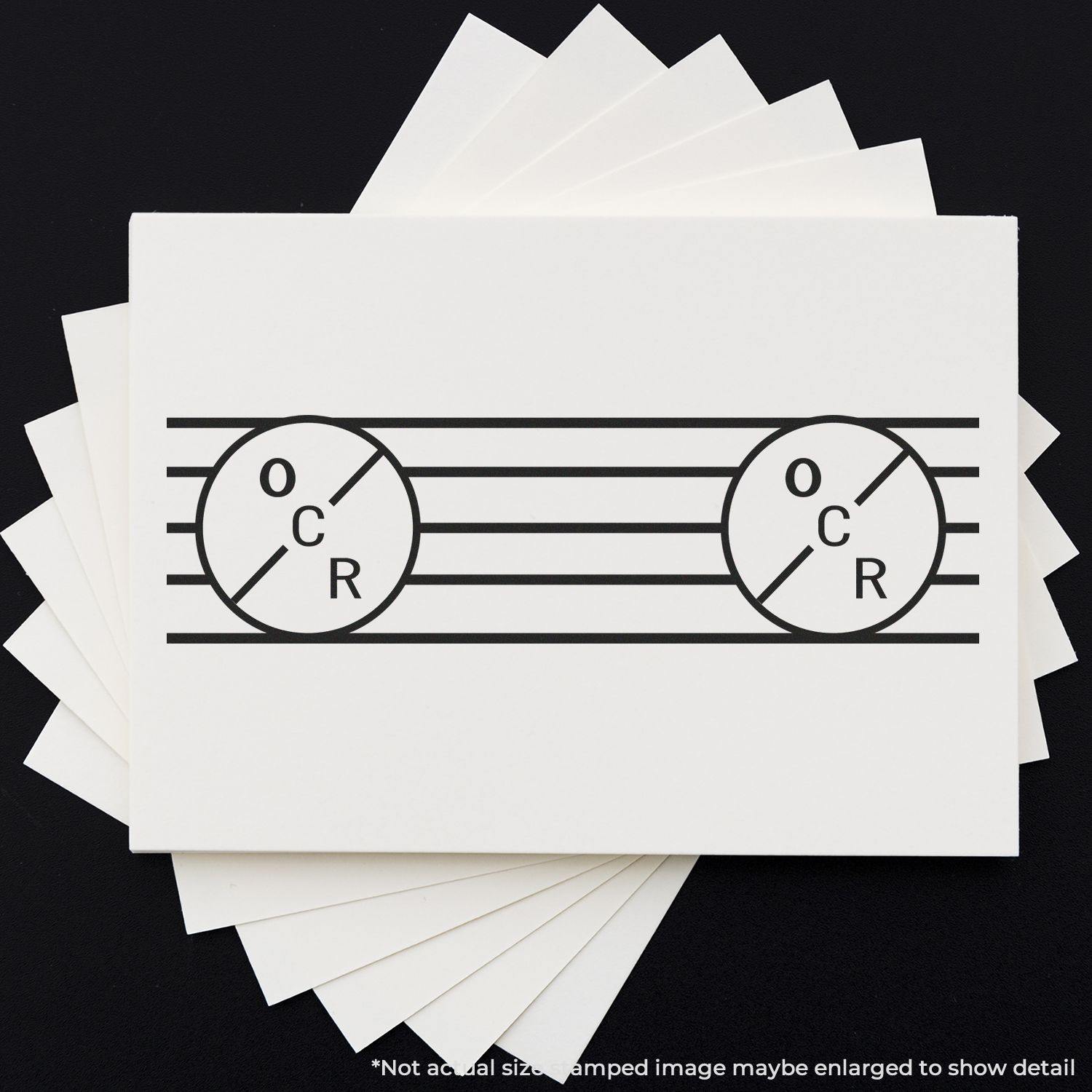 Large OCR Rubber Stamp used on white paper, creating a design with two circles labeled OCR and horizontal lines in between.