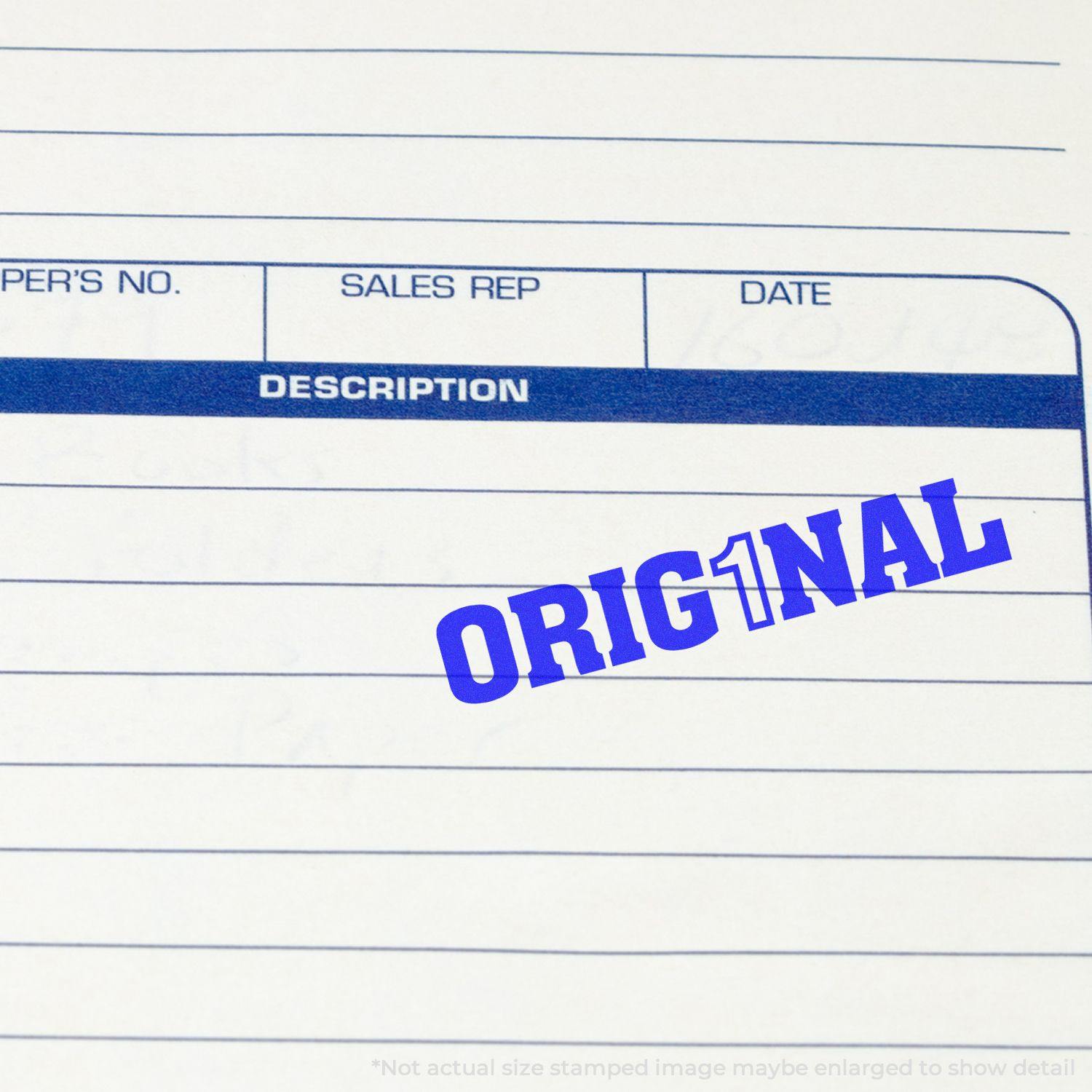 Large Self Inking Orig1nal Stamp in blue ink on a document form, showing the word 'ORIG1NAL' stamped clearly in bold letters.