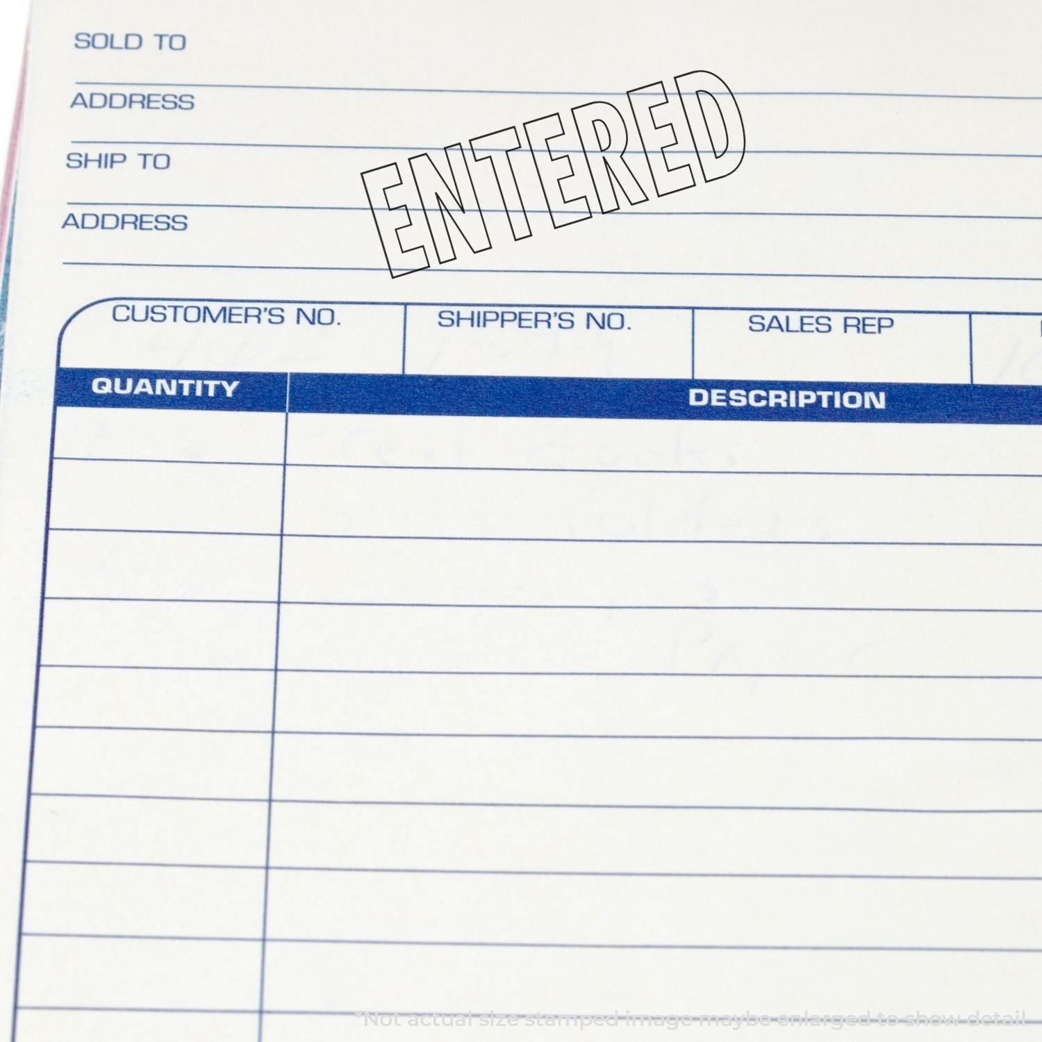 Close-up of a form stamped with ENTERED using the Self Inking Outline Entered Stamp, showing fields for customer and shipping details.