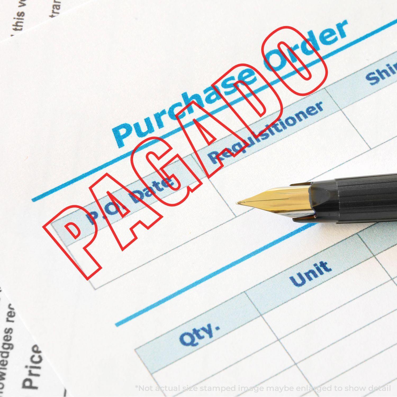 A purchase order stamped with PAGADO in red ink using the Large Self Inking Outline Pagado Stamp, with a pen placed beside it.