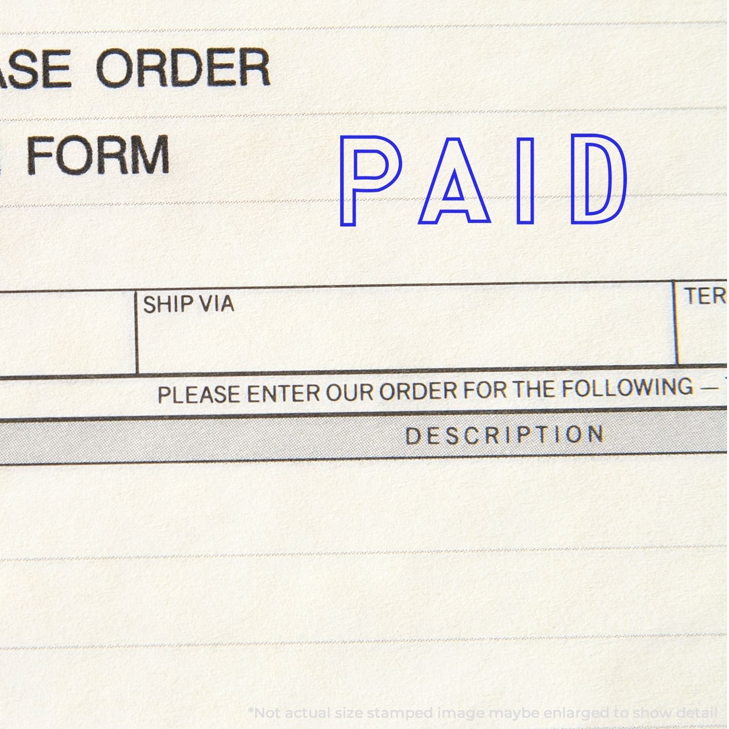 A purchase order form stamped with PAID using the Self Inking Outline Paid Stamp in blue ink.