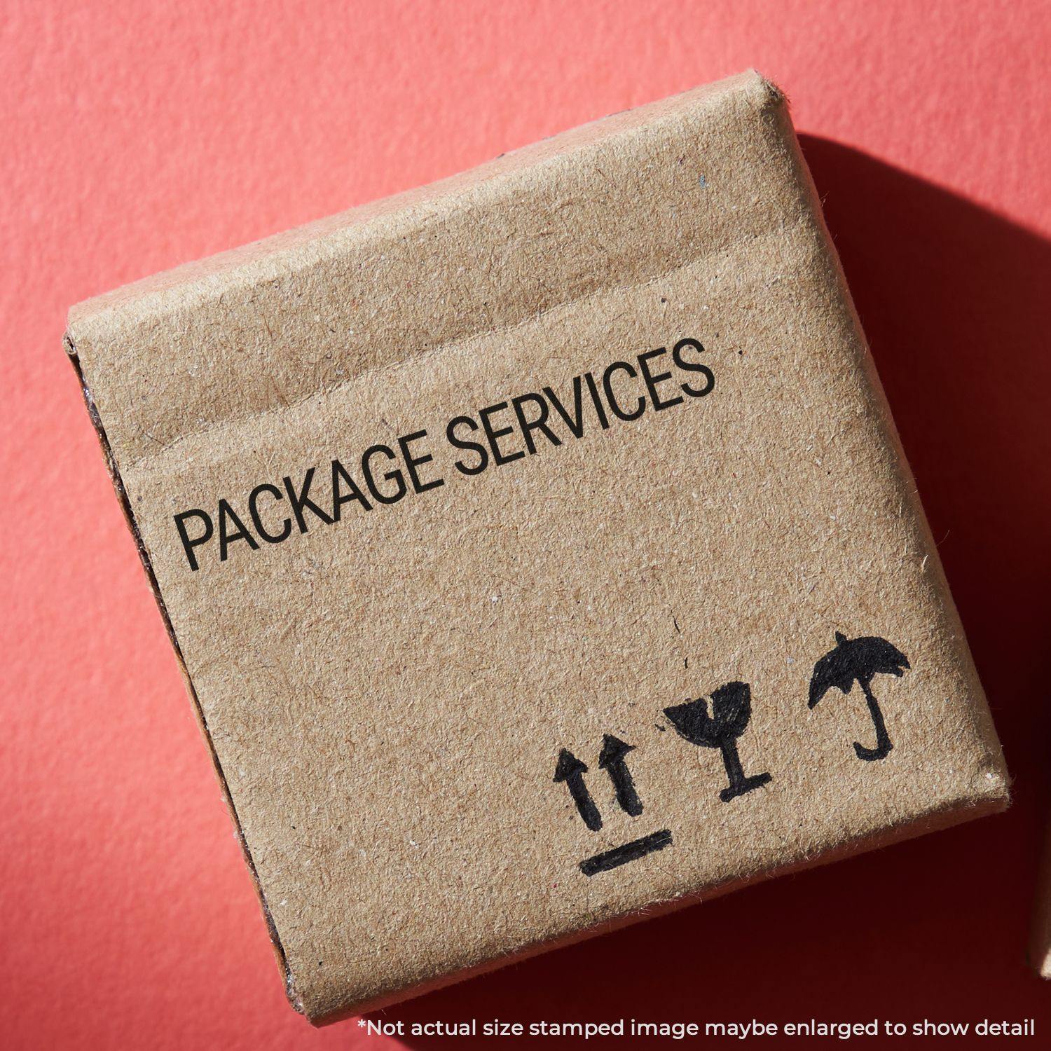 Package Services rubber stamp on a cardboard box with shipping symbols against a red background.