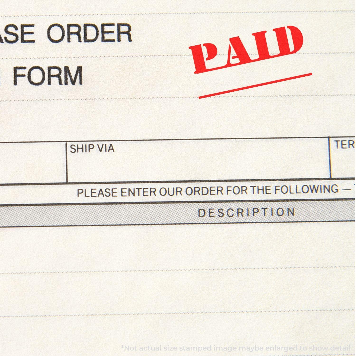 Slim Pre-Inked Paid with Date Line Stamp used on a purchase order form, showing a red PAID mark on the document.