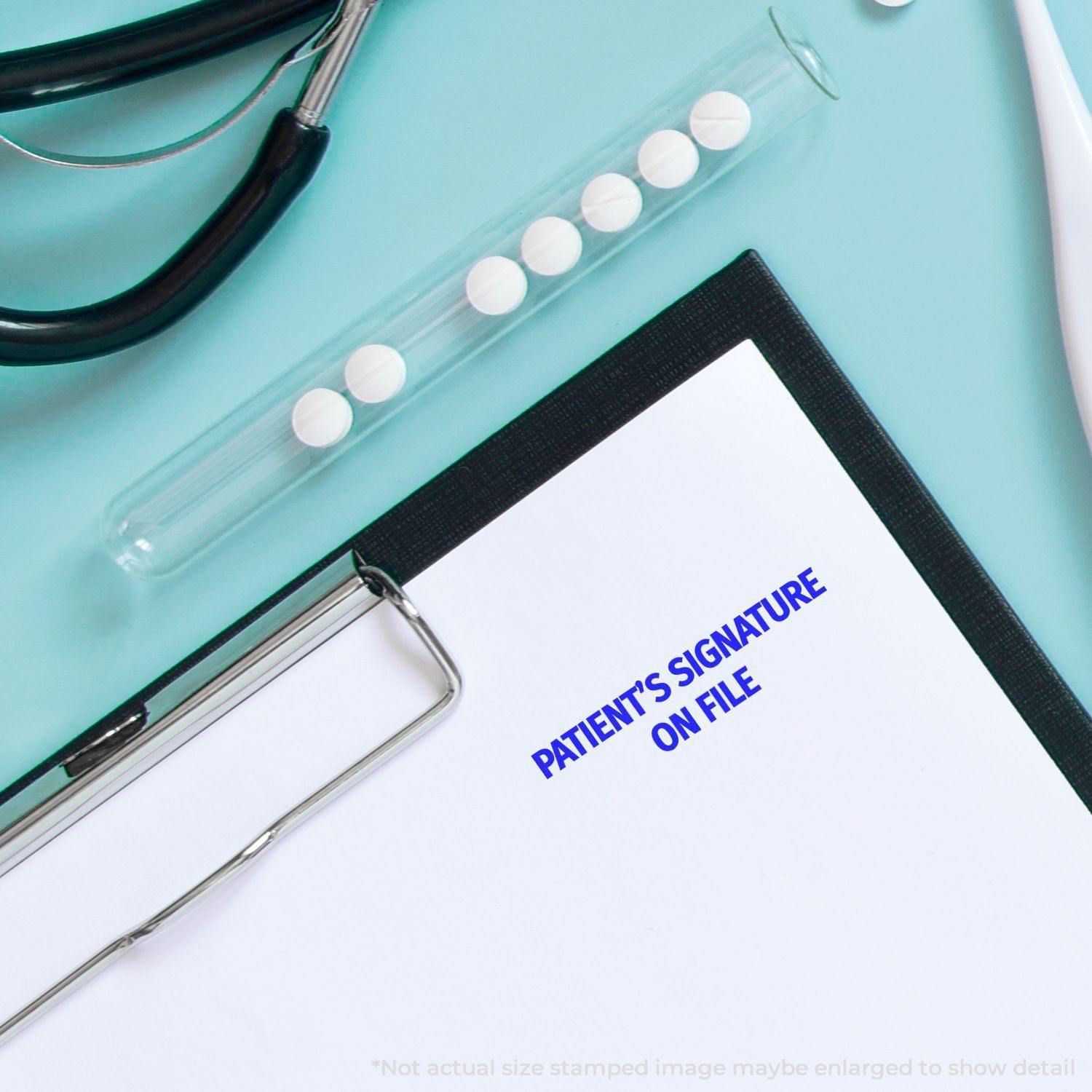 Slim Pre-Inked Patients Signature on File Stamp used on a document, surrounded by medical tools and a clipboard.