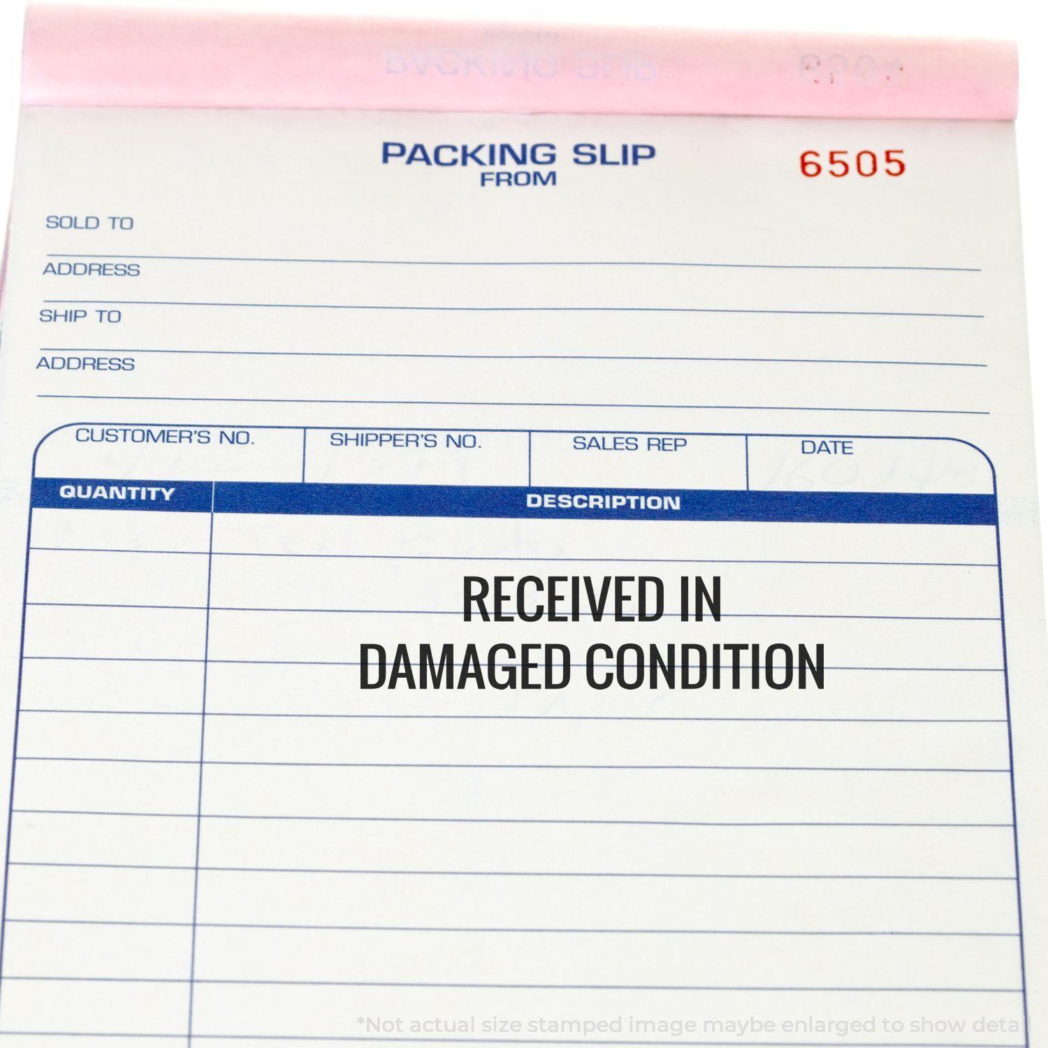 Packing slip with RECEIVED IN DAMAGED CONDITION stamped using the Large Pre-Inked Received in Damaged Condition Stamp.