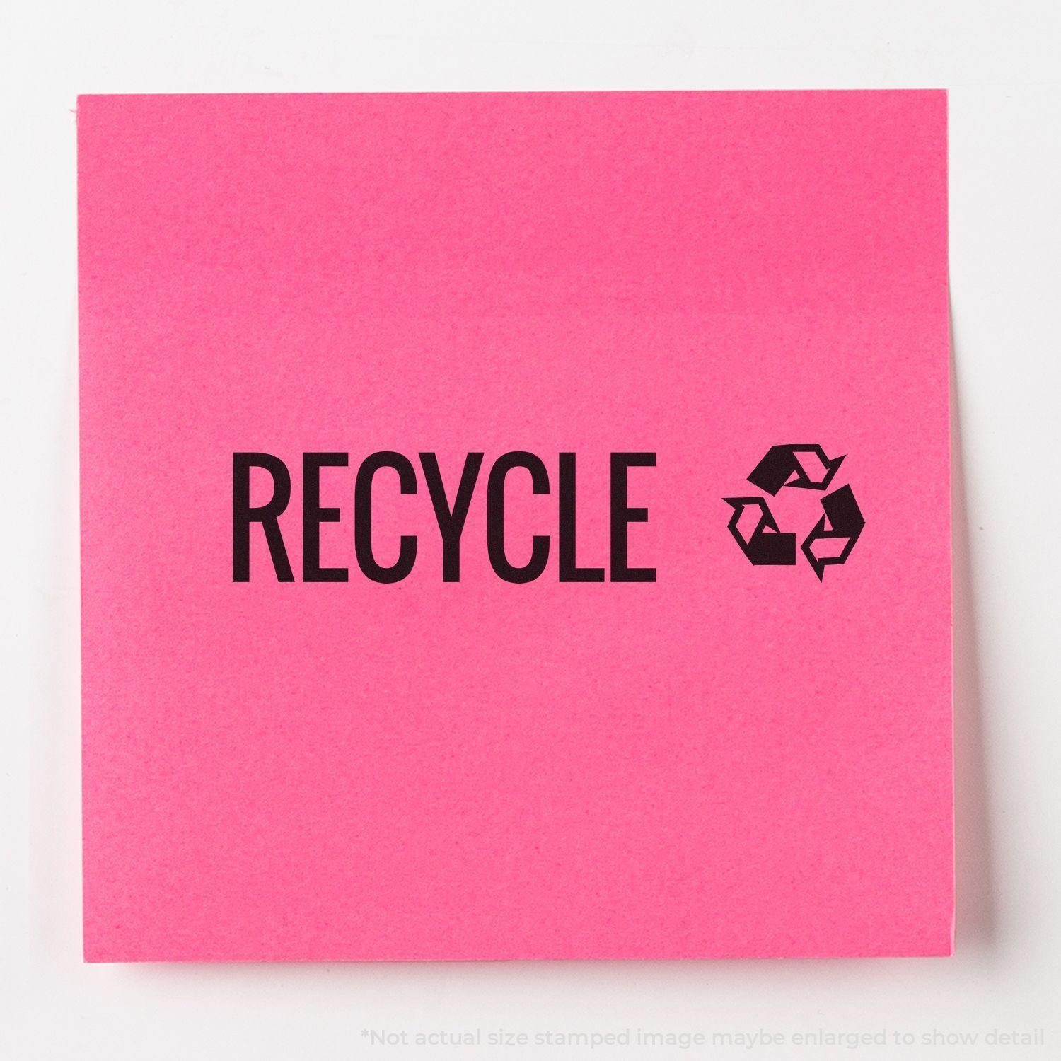 Slim Pre-Inked Recycle with Logo Stamp on a pink sticky note, showing the word RECYCLE and a recycling symbol.