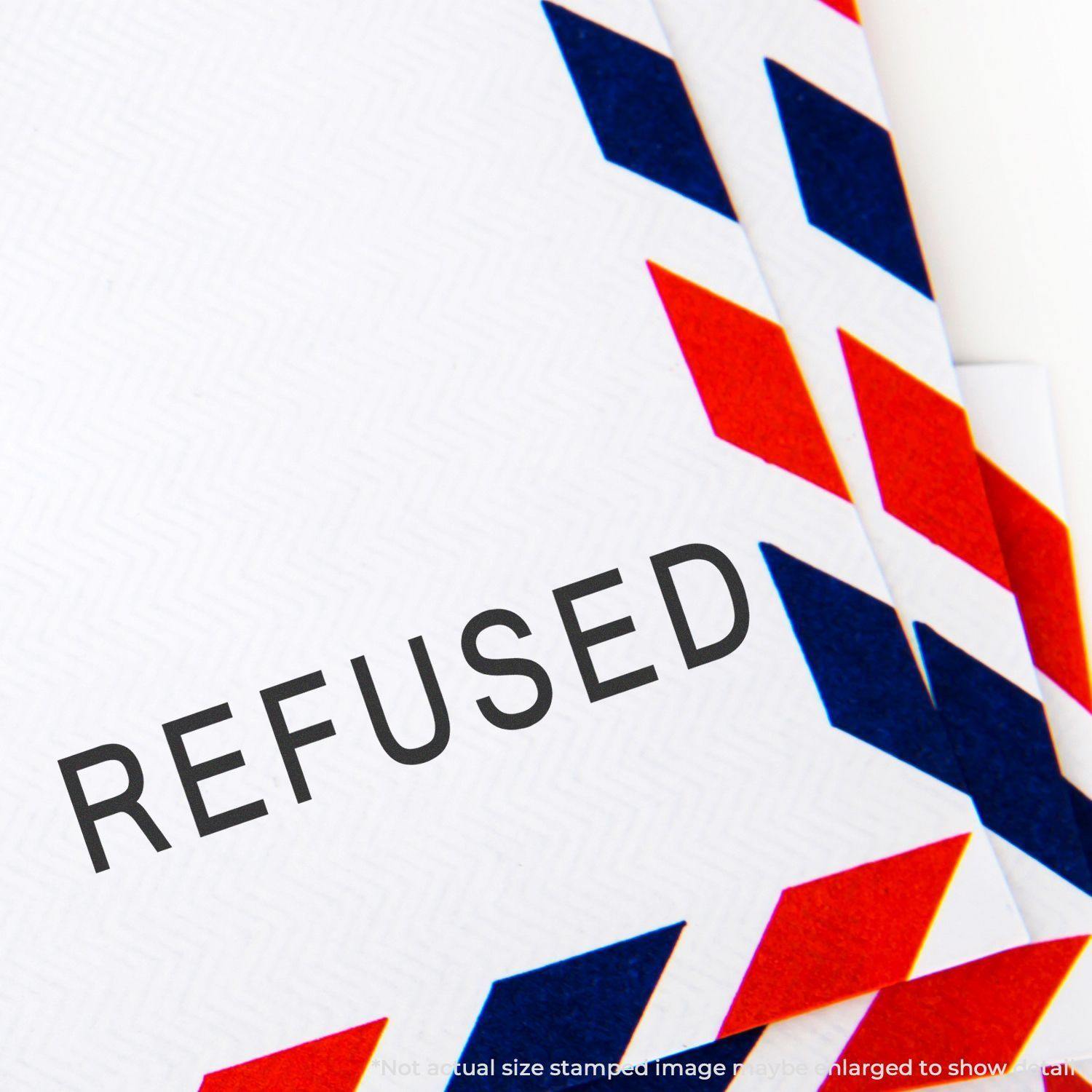 Envelope stamped with REFUSED using the Large Pre-Inked Refused Stamp, showing clear, bold text on a white background with red and blue accents.