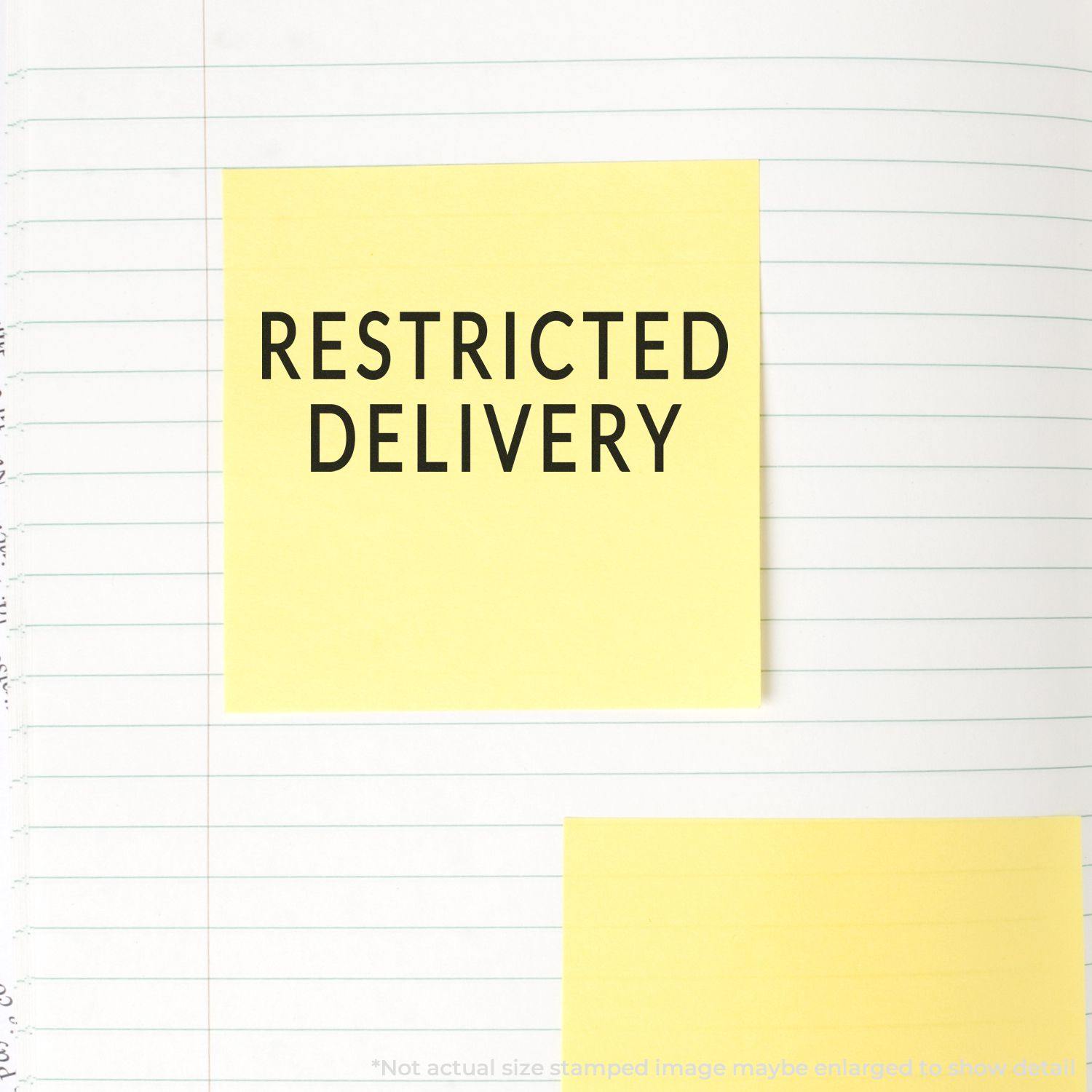 Large Self Inking Restricted Delivery Stamp used on a lined notebook, showing clear and bold RESTRICTED DELIVERY text on a yellow sticky note.