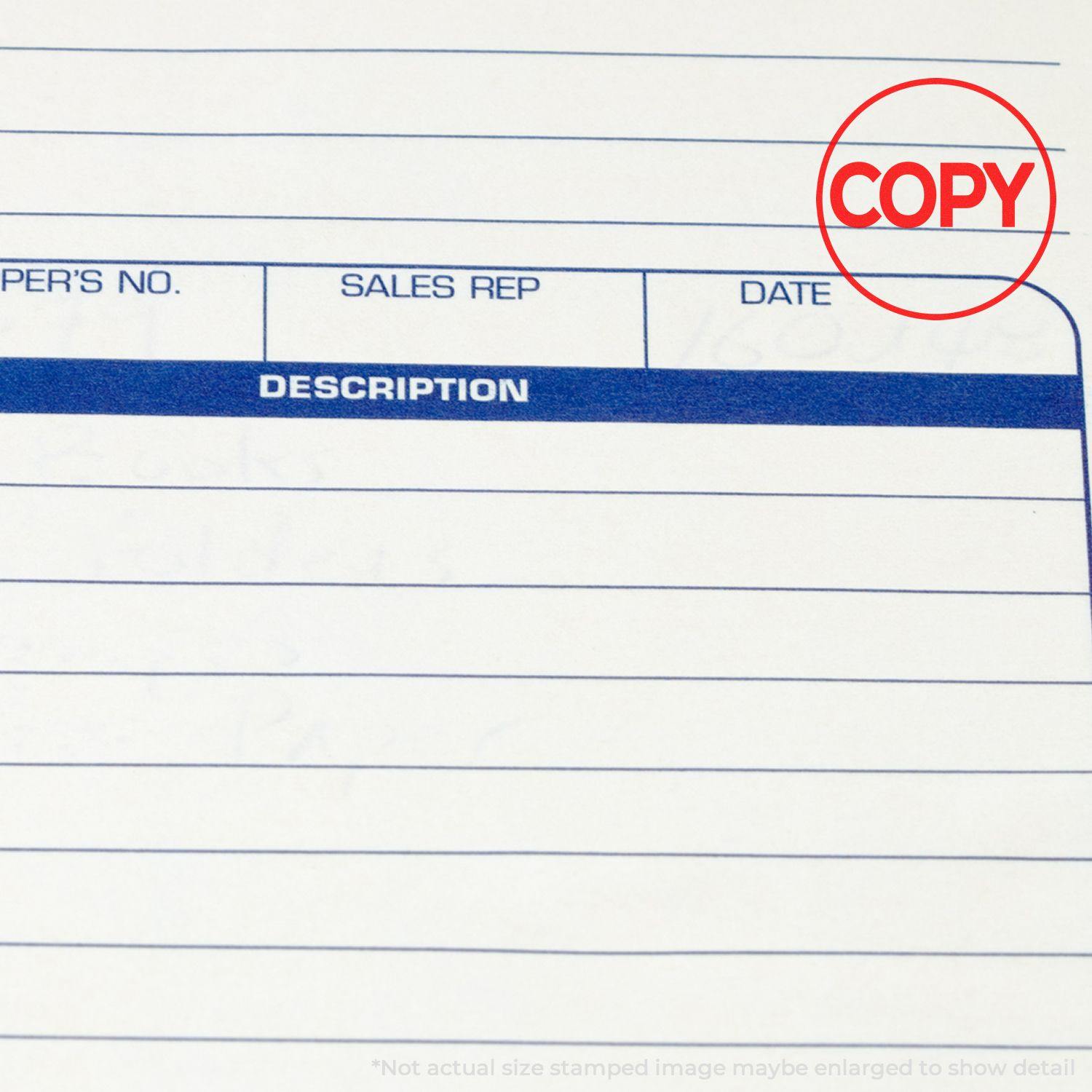 Round Copy Rubber Stamp in red ink on a lined document with sections for description, sales rep, and date.