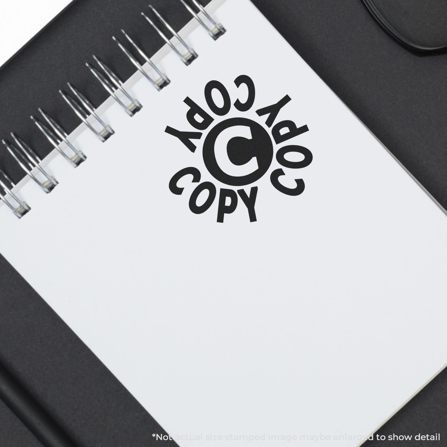 Round Copy Copy Copy Rubber Stamp impression on a spiral notebook page, showing the stamped text in black ink.