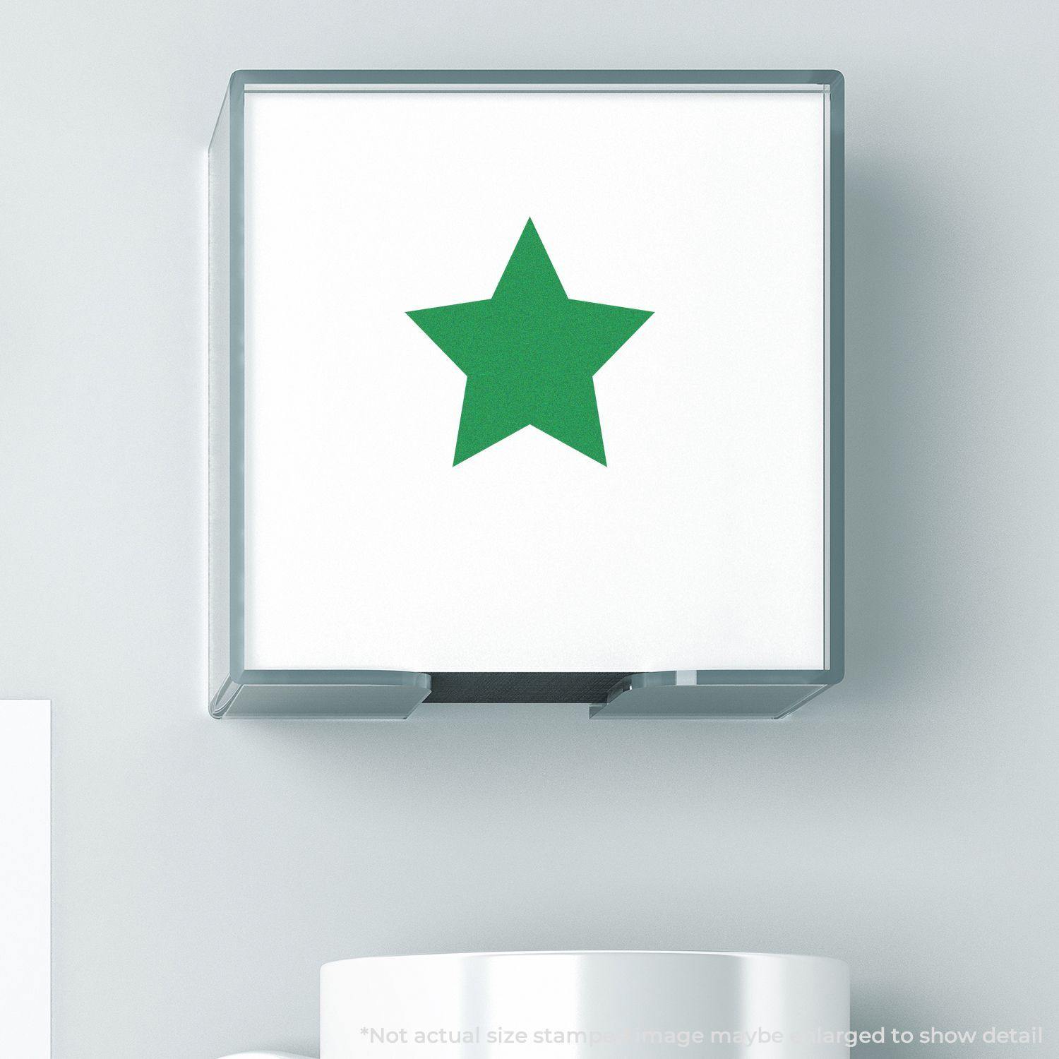 Round Solid Star Rubber Stamp with a green star design, displayed in a clear case against a light background.