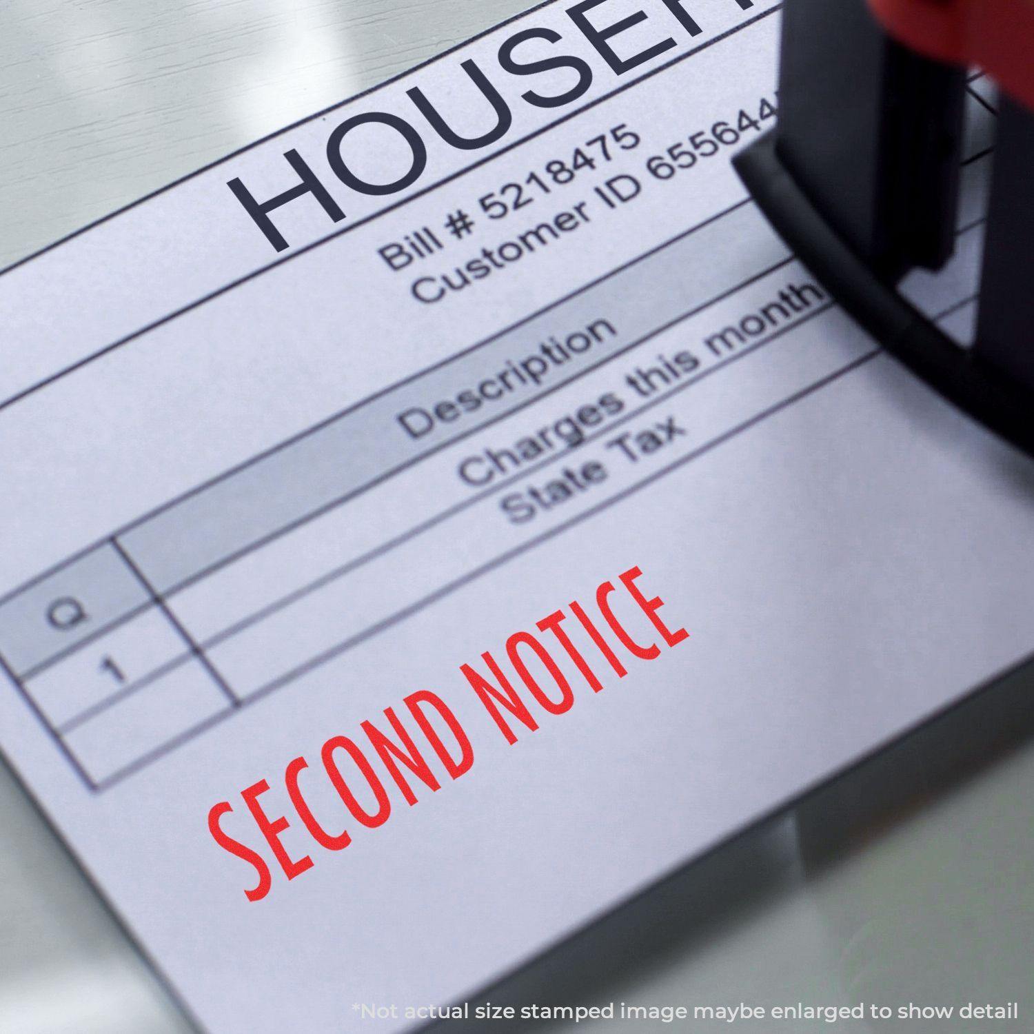 A Large Self Inking Second Notice Stamp marks a bill with SECOND NOTICE in red ink, emphasizing overdue payment.