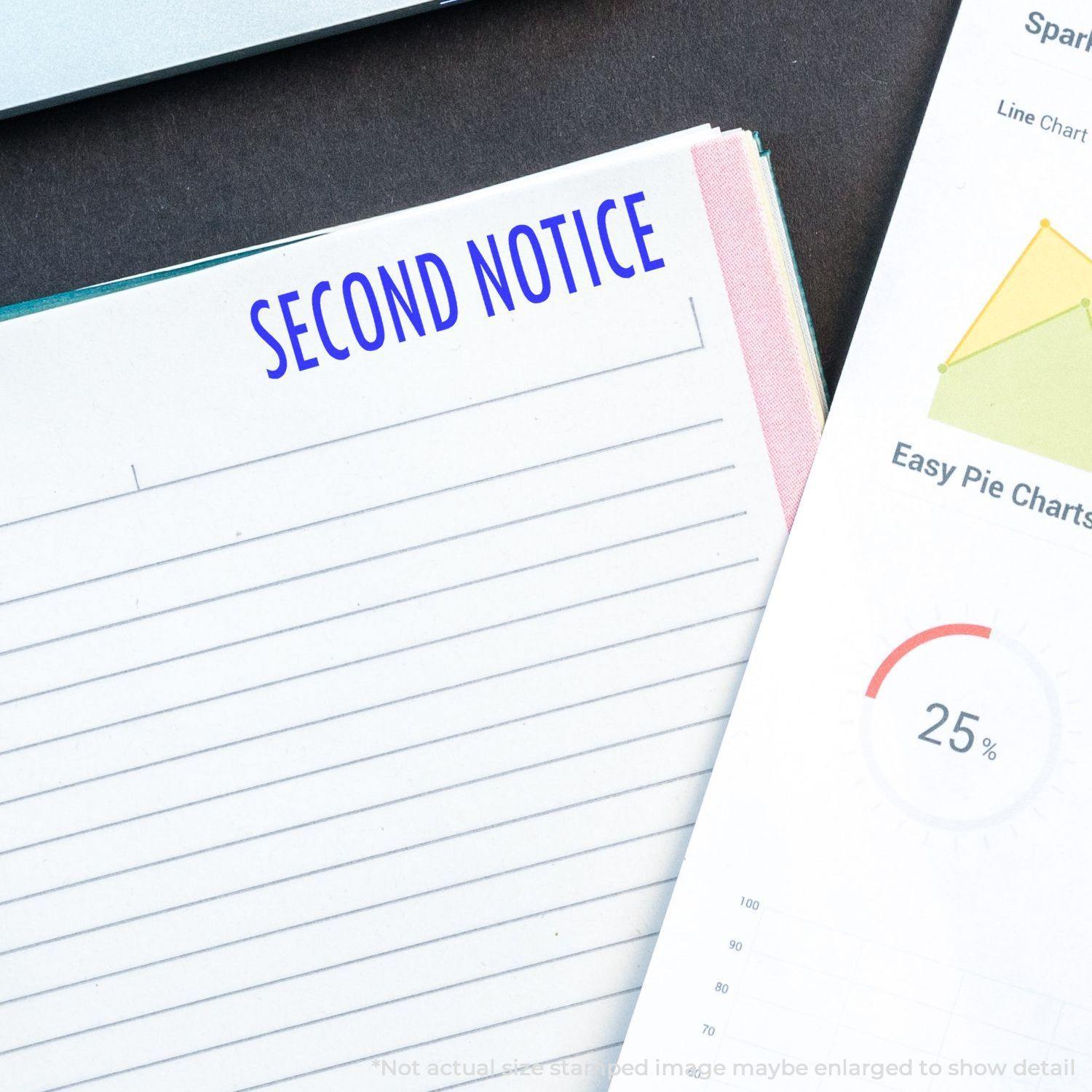 Large Self Inking Second Notice Stamp used on a lined paper, with a chart document beside it, highlighting the stamped 'SECOND NOTICE' text.