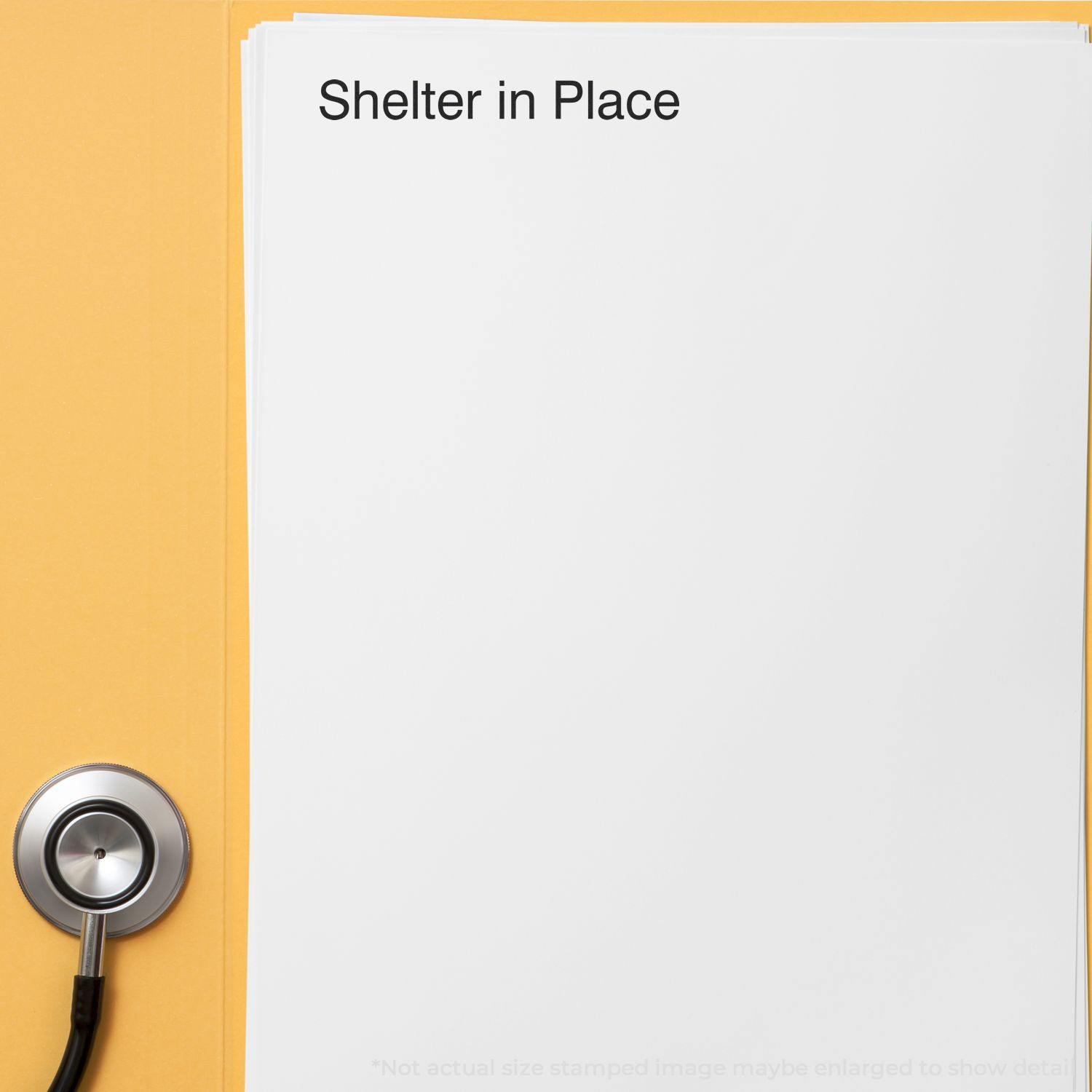 Slim Pre-Inked Shelter in Place Stamp used on a white paper, placed on a yellow surface next to a stethoscope.