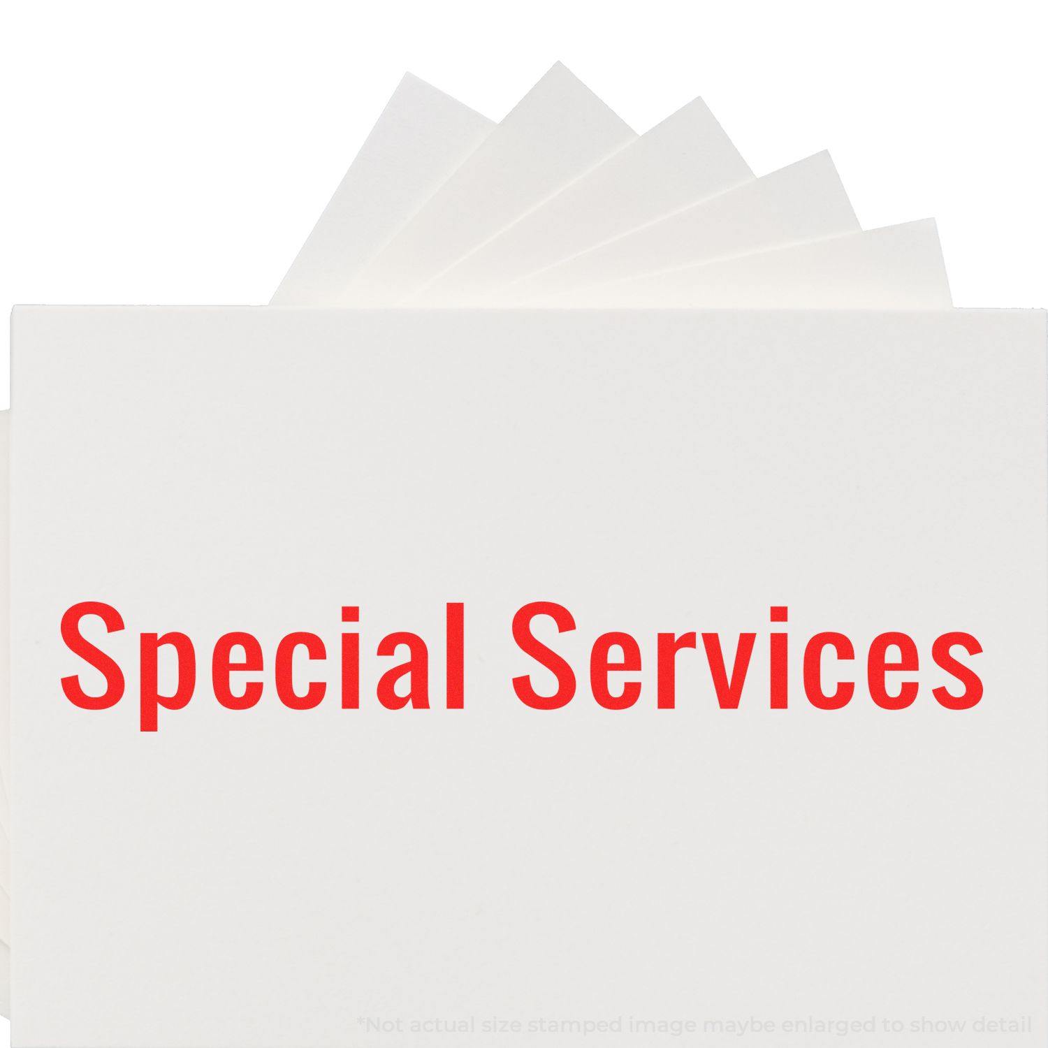 Image of a Large Pre-Inked Special Services Stamp imprinting Special Services in red on white paper with multiple sheets fanned out behind.