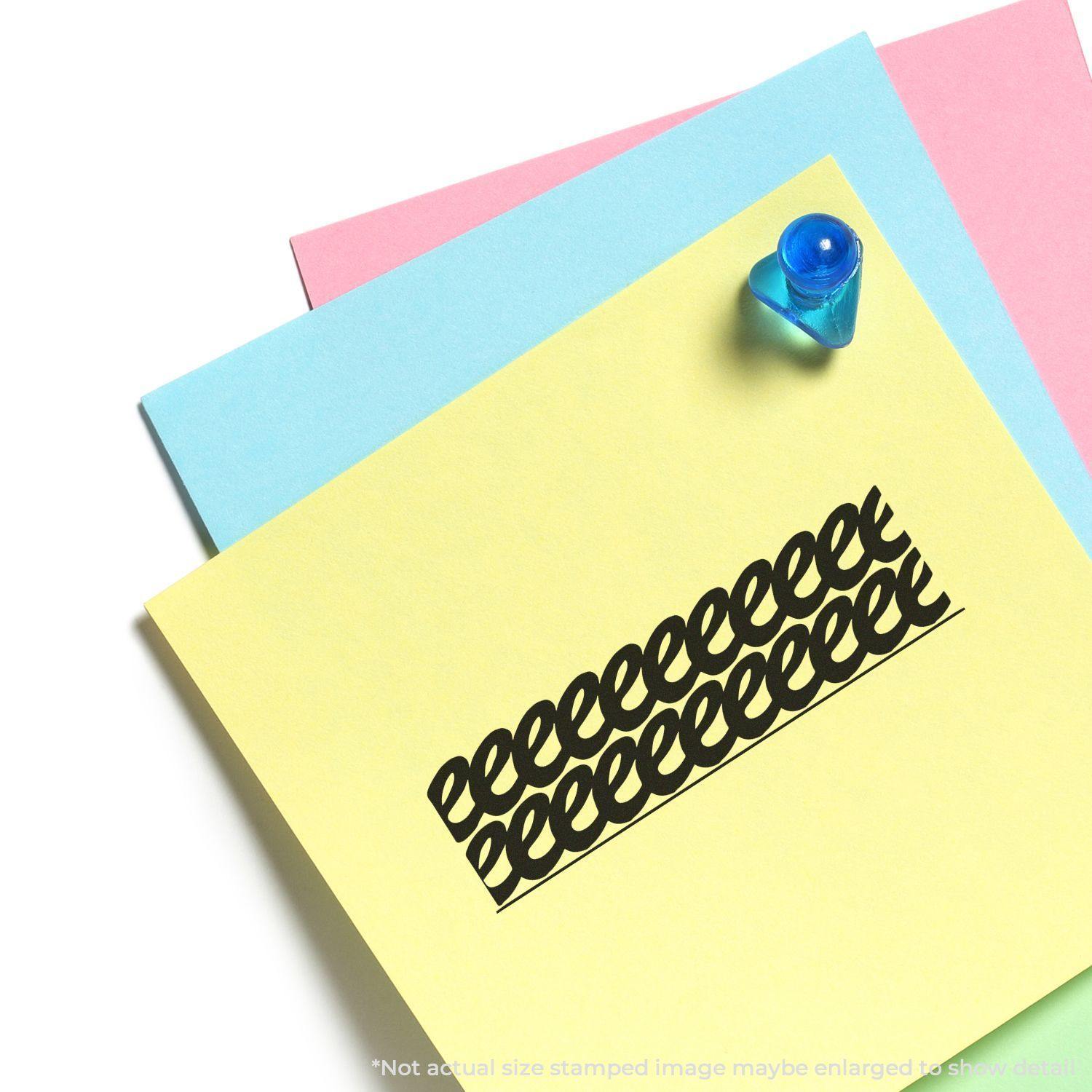 Large Pre-Inked Strikeout Stamp used on a yellow sticky note with blue and pink notes in the background, and a blue pushpin on top.