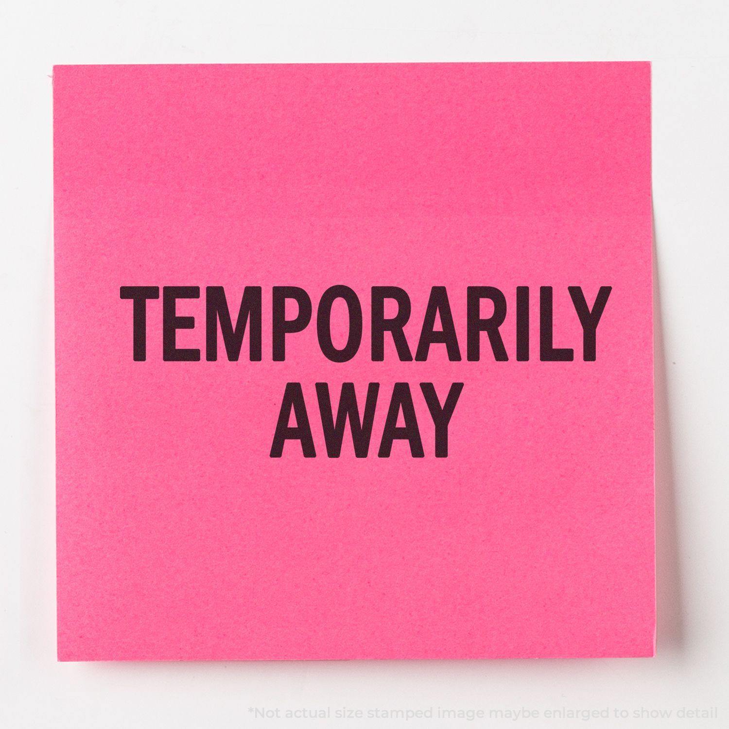 Pink sticky note with bold black text reading TEMPORARILY AWAY, stamped using a Temporarily Away Rubber Stamp.