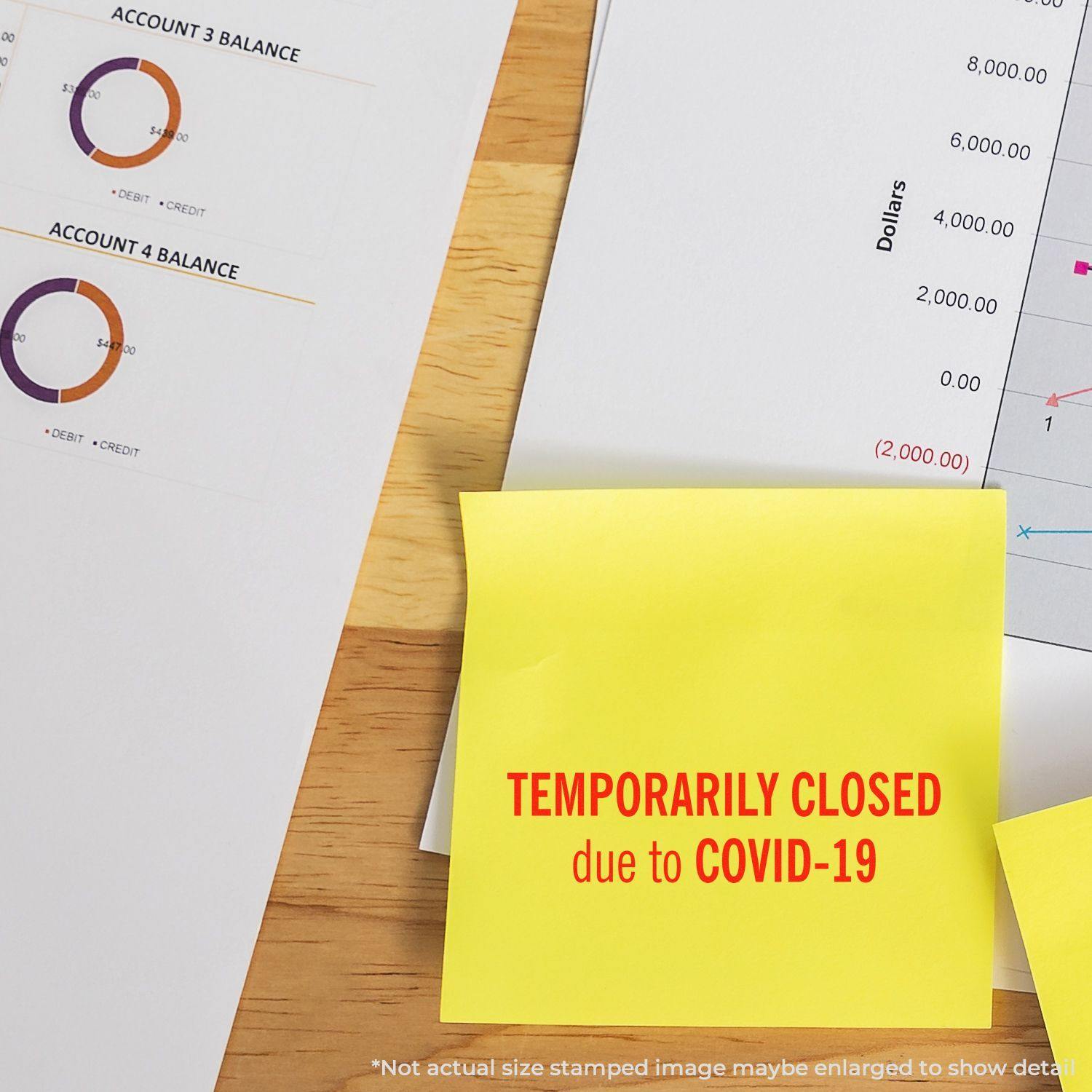 Large Temporarily Closed Rubber Stamp on a yellow sticky note with TEMPORARILY CLOSED due to COVID-19 next to financial documents.