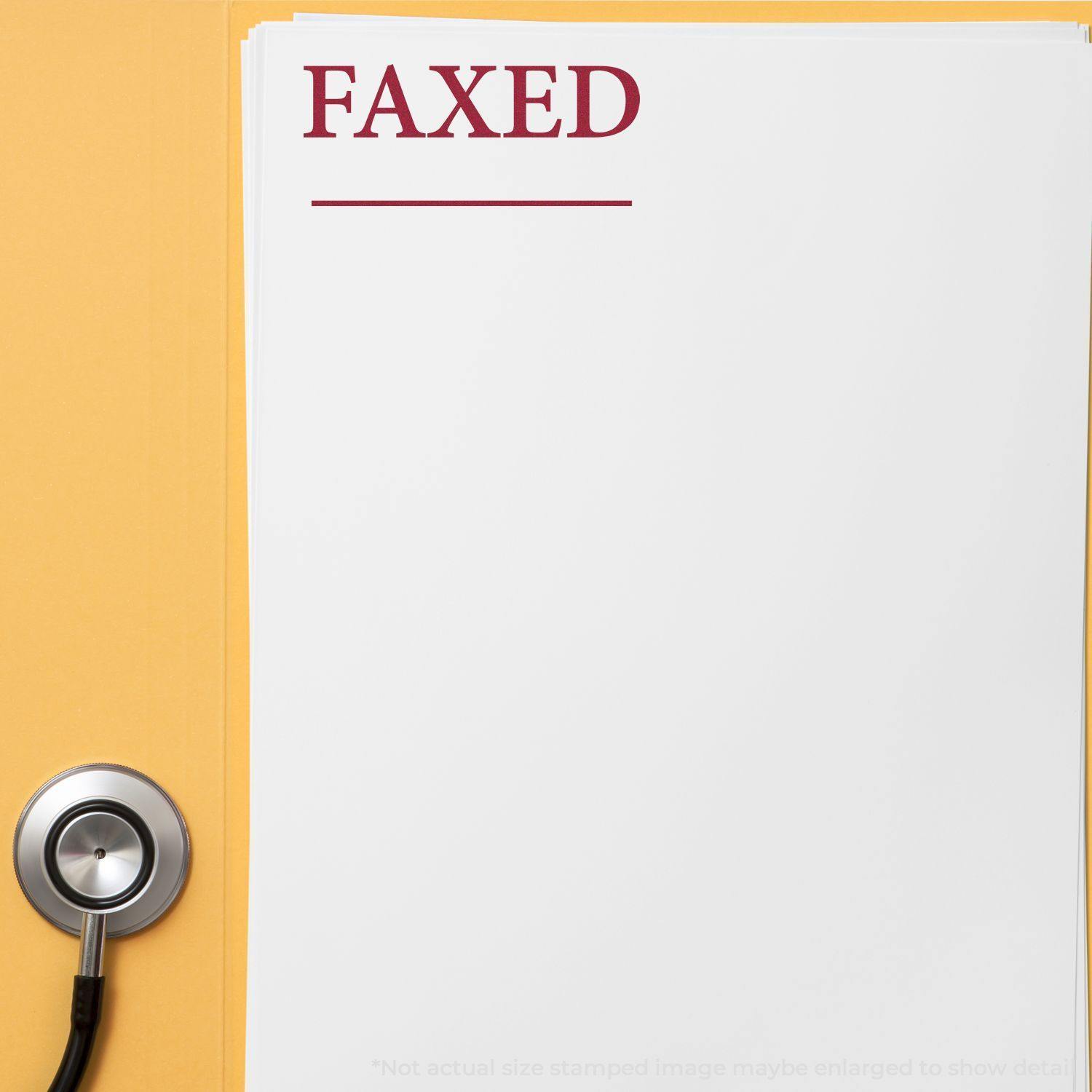 Large Pre-Inked Times Faxed with Line Stamp used on a stack of white papers next to a stethoscope on a yellow background.