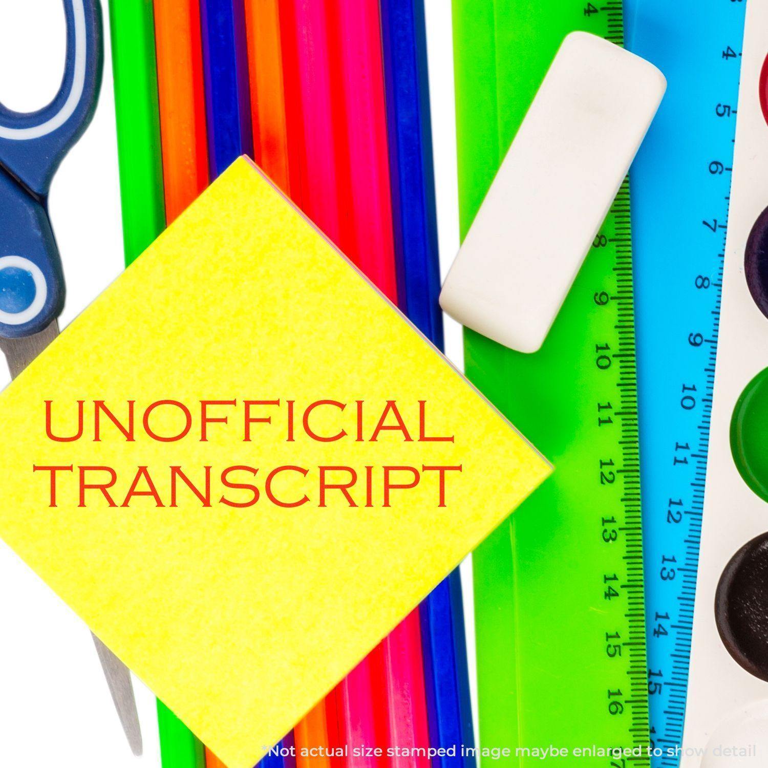 Self Inking Unofficial Transcript Stamp on a yellow paper surrounded by colorful stationery items like scissors, ruler, and eraser.