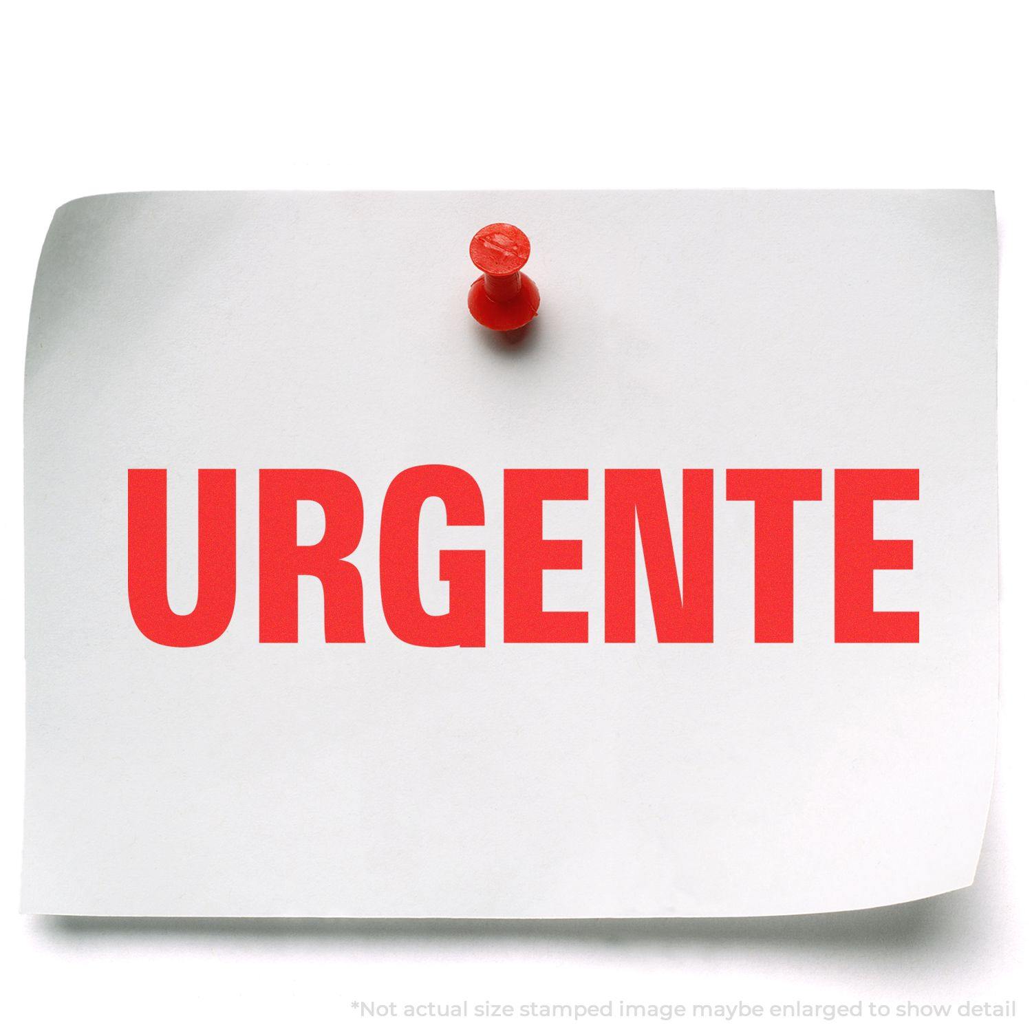 Large Pre-Inked Urgente Stamp used on a white paper pinned to a board, displaying the word URGENTE in bold red letters.