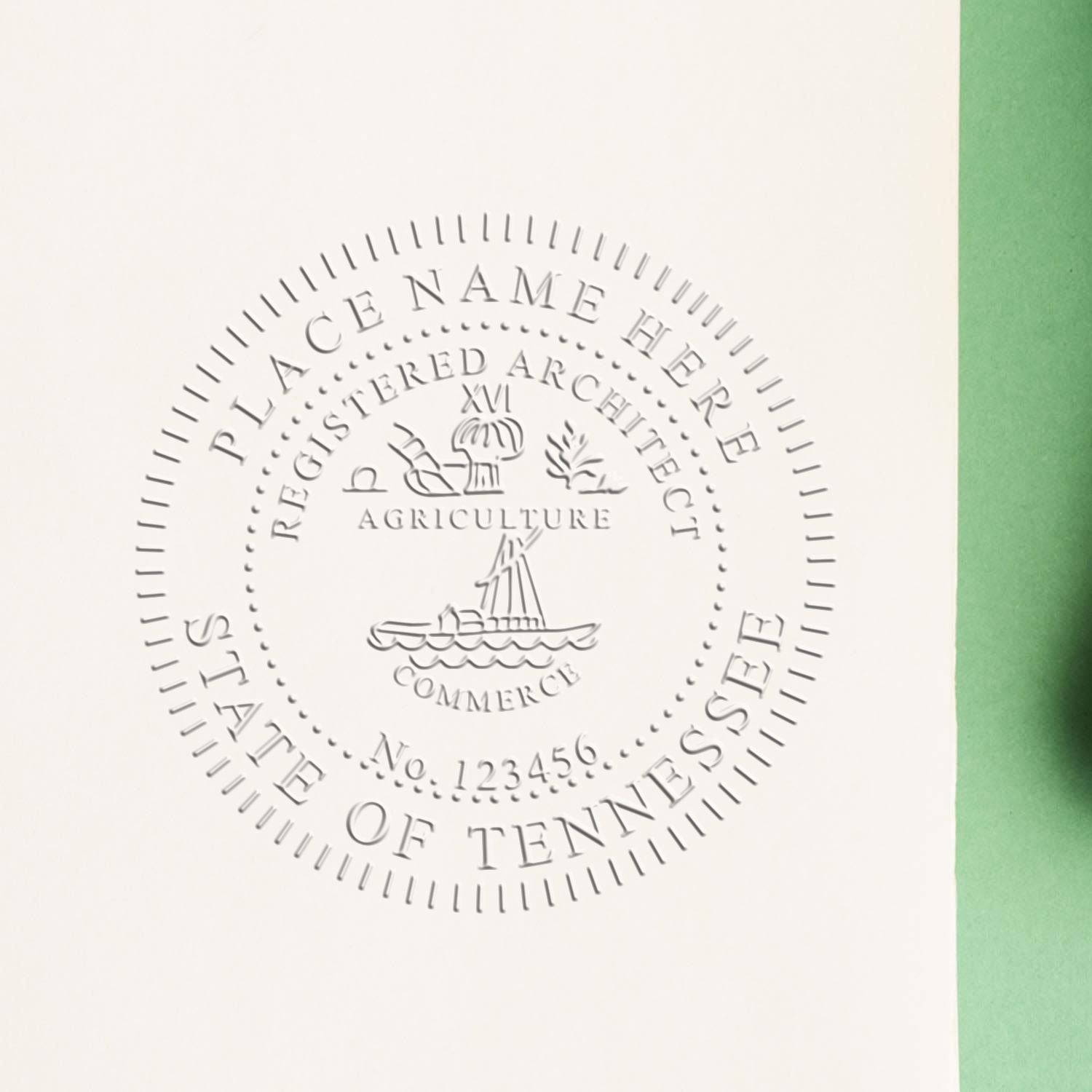 A lifestyle photo showing a stamped image of the Tennessee Desk Architect Embossing Seal on a piece of paper